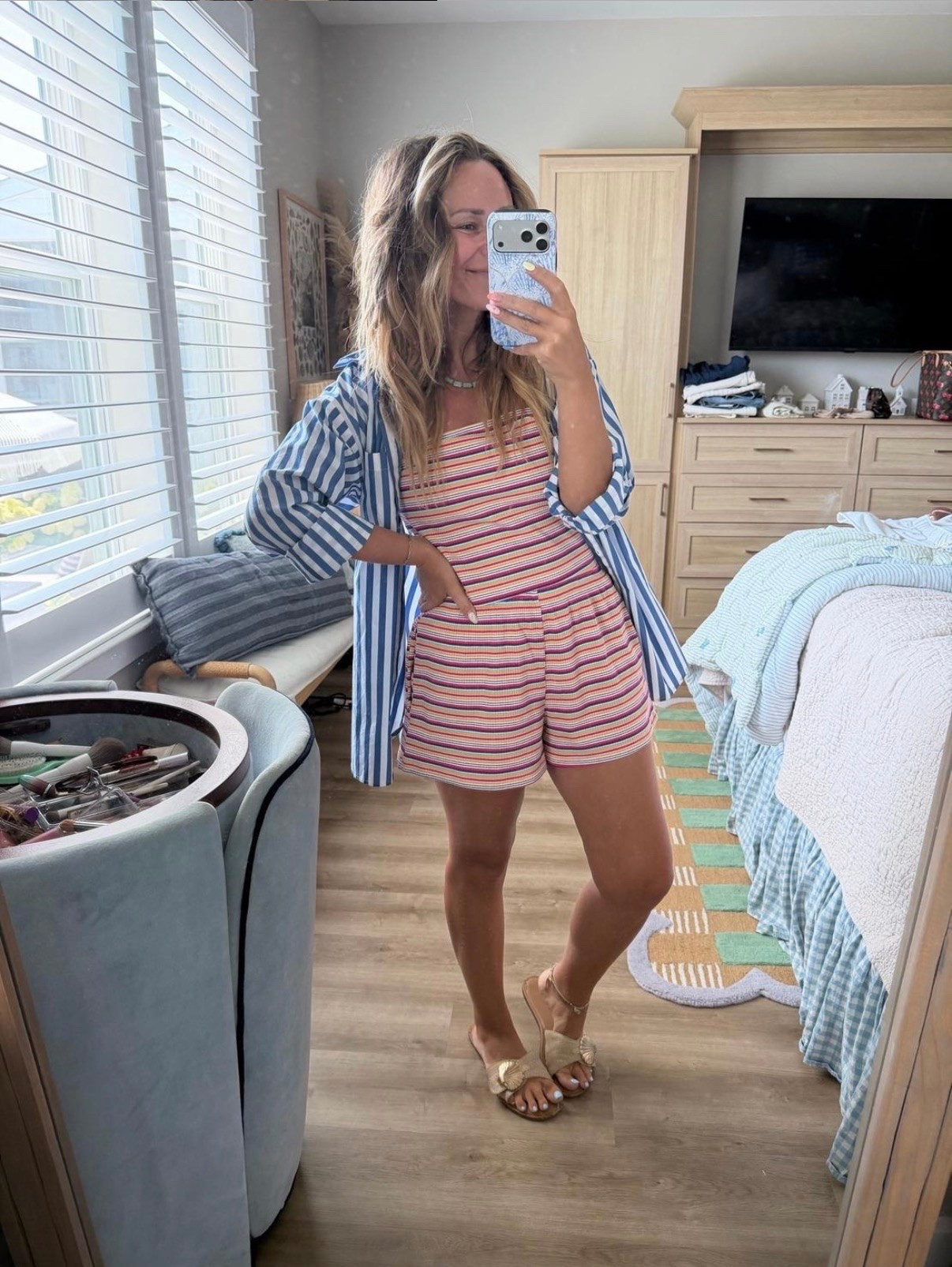 Colorful, comfy, and made for summer. 🌈☀️

This striped matching set is one of those outfits that looks like you put in effort, but feels like pajamas. I threw on an oversized striped button-down as a lightweight layer and finished it with neutral sandals for the easiest vacation-to-weekend look.

striped matching set, colorful summer outfit, knit matching set, sweater tank, knit shorts, beach vacation outfit, resort wear, colorful outfit, casual summer style, oversized striped button-down, layering piece, vacation style, coastal outfit, weekend outfit, comfy chic, summer fashion.