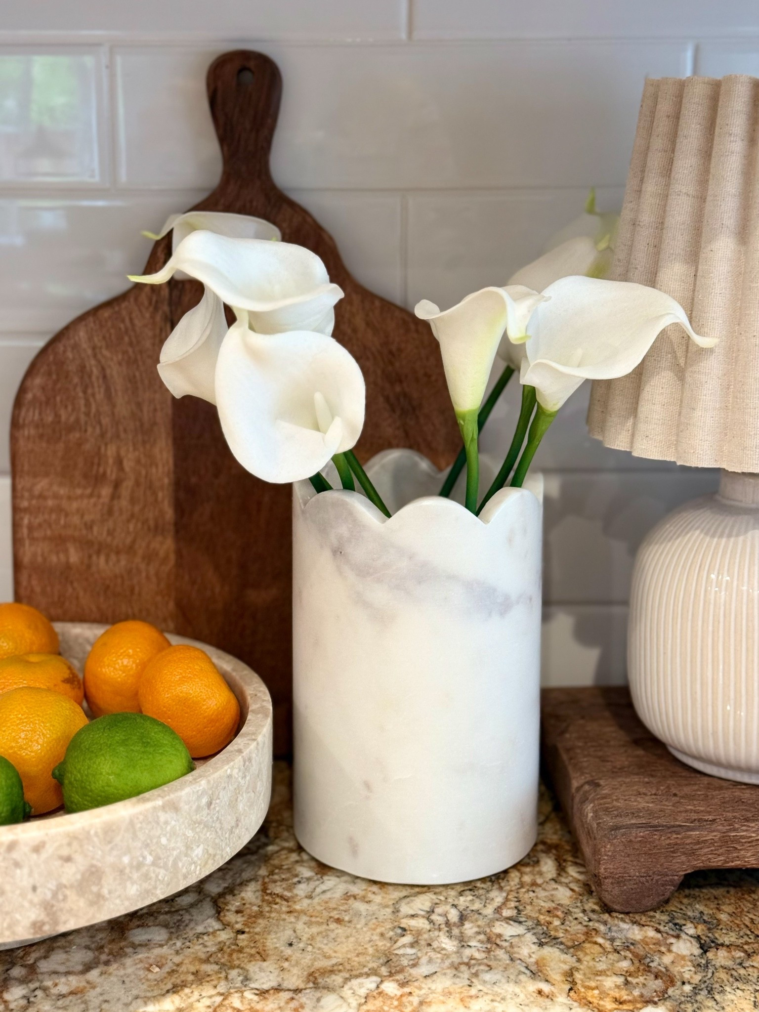 Kitchen counter styling. 

How beautiful and unique is this marble bucket? I love it not only to rest your  wine, when you’re entertaining, but as a vase or utensil holder.

#LTKHome #LTKU #LTKSeasonal