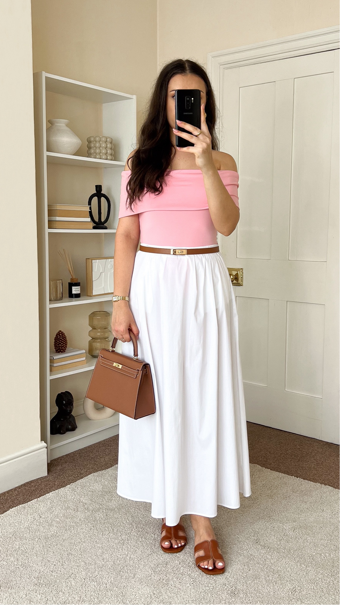 Casual & chic summer outfit. Skirt is Mango, wearing size S. Top is H&M, wearing size S. Bag is Totes Luxe Uk,

#LTKuk #LTKsummer #LTKeurope