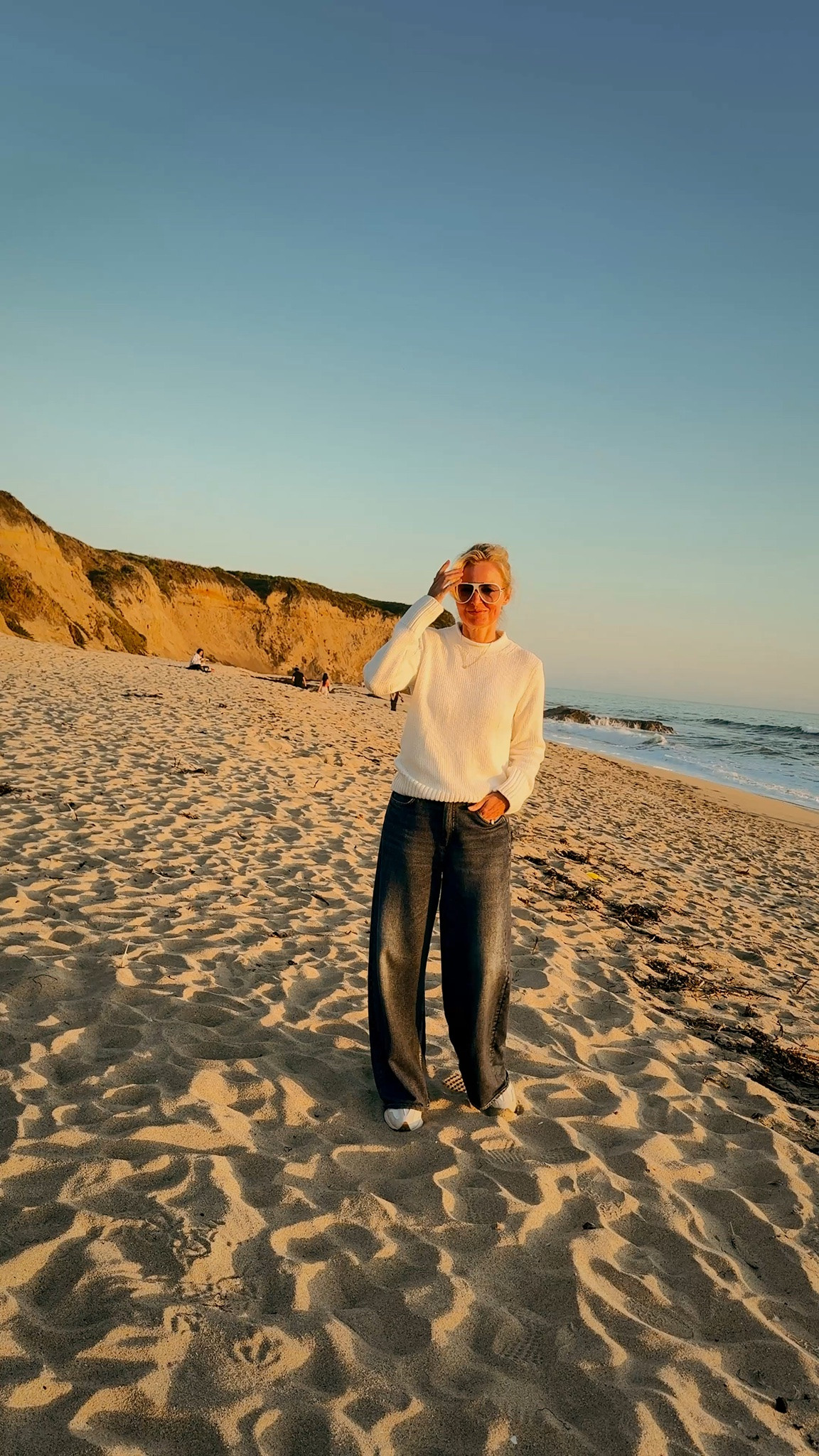 These jeans are viral for a reason… fit and feel like sweats and look like jeans. Paired these super comfy jeans with my favorite cotton sweater for summer that you can easily wear year round.

#LTKootd #LTKOver40