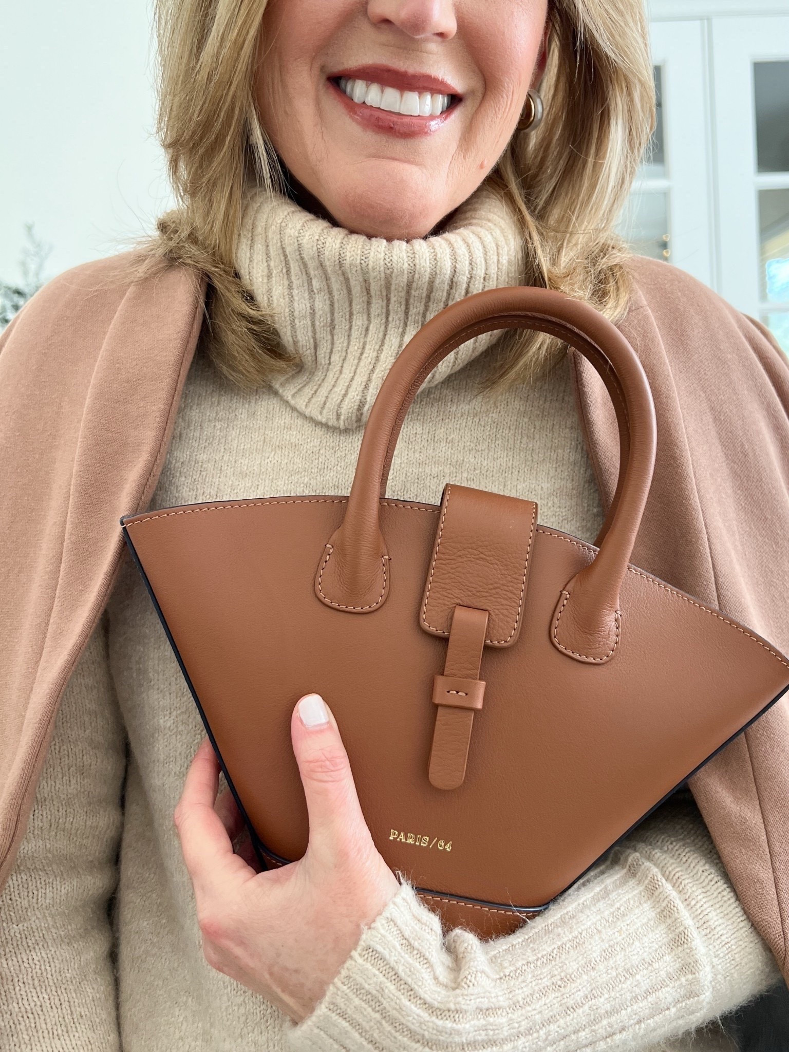 ❤️LOVE. LOVE. LOVE. This handbag from Paris 64!  
The leather is buttery soft and the details are amazing.
The Mini Lumiere in Caramel is chic, stylish, and elevates any outfit!

#LTKHoliday #LTKGiftGuide #LTKShoeCrush #LTKItBag 

#LTKSaleAlert #LTKSeasonal #LTKOver40 #LTKWorkwear #LTKMidsize #LTKootd