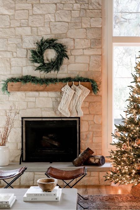 Here’s a simple holiday mantel styling idea featuring this faux cypress garland, pine wreath, knit stockings, and dried birch twigs. A few of my favorite holiday staples! I’m unable to link these World Market stockings, so I linked a similar version here! 
***The real touch Pune garland would be a great alternative to my garland since this one just sold out. I also have the real touch pine and it’s beautiful 🤍

#LTKHoliday #LTKsalealert #LTKhome