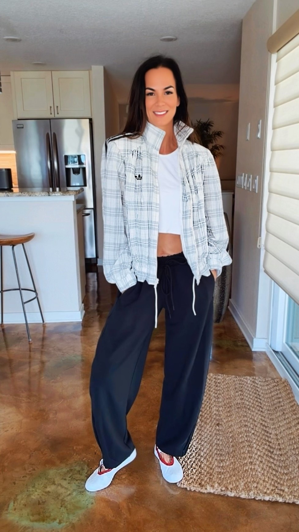 adidas understood the assignment… sporty, but make it fashion. 🤎

These all-new barrel pants may officially be the softest pants I’ve ever put on—and the subtle adidas stripes down the sides make them feel extra elevated. I paired them with a cropped tank and this plaid adidas jacket complete with shoulder pads, a mock neck and an adjustable hem you can cinch for more of a bubble shape.

Finished with adidas Mary Janes and my Dior sunnies because apparently we’re accessorizing for the gym now. 😂

#adidasstyle #SportyChic #BarrelPants #EverydayStyle #NicoleColee

#LTKootd #LTKdayinmylife #LTKgrwm