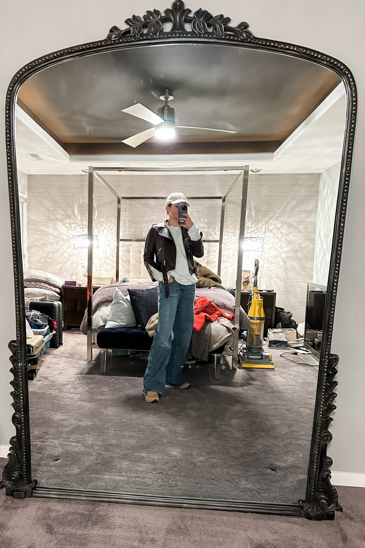 Influencer mirror status unlocked 😏 My Xmas gift came, and she’s beautiful. I’ve been eyeing this gorgeous, yet massive (7’ Large, Antique Black) piece of hardware for several years. It’s on sale rarely, and we pulled the trigger on this one when Anthro had their 30% markdown before the holidays. 💯 worth it 🥰 Now I have to clean my room 😉// standing mirror, primrose mirror, ornate mirror, tall mirror, floor mirror, leaning mirror, full length mirror, statement mirror, skater jeans, puddle jeans, good American jeans, oversized sweatshirt, leather biker jacket, burgundy jacket, Sherpa sneakers, Sherpa hat, Sherpa baseball hat, casual look, casual outfit

#LTKhome #LTKstyletip