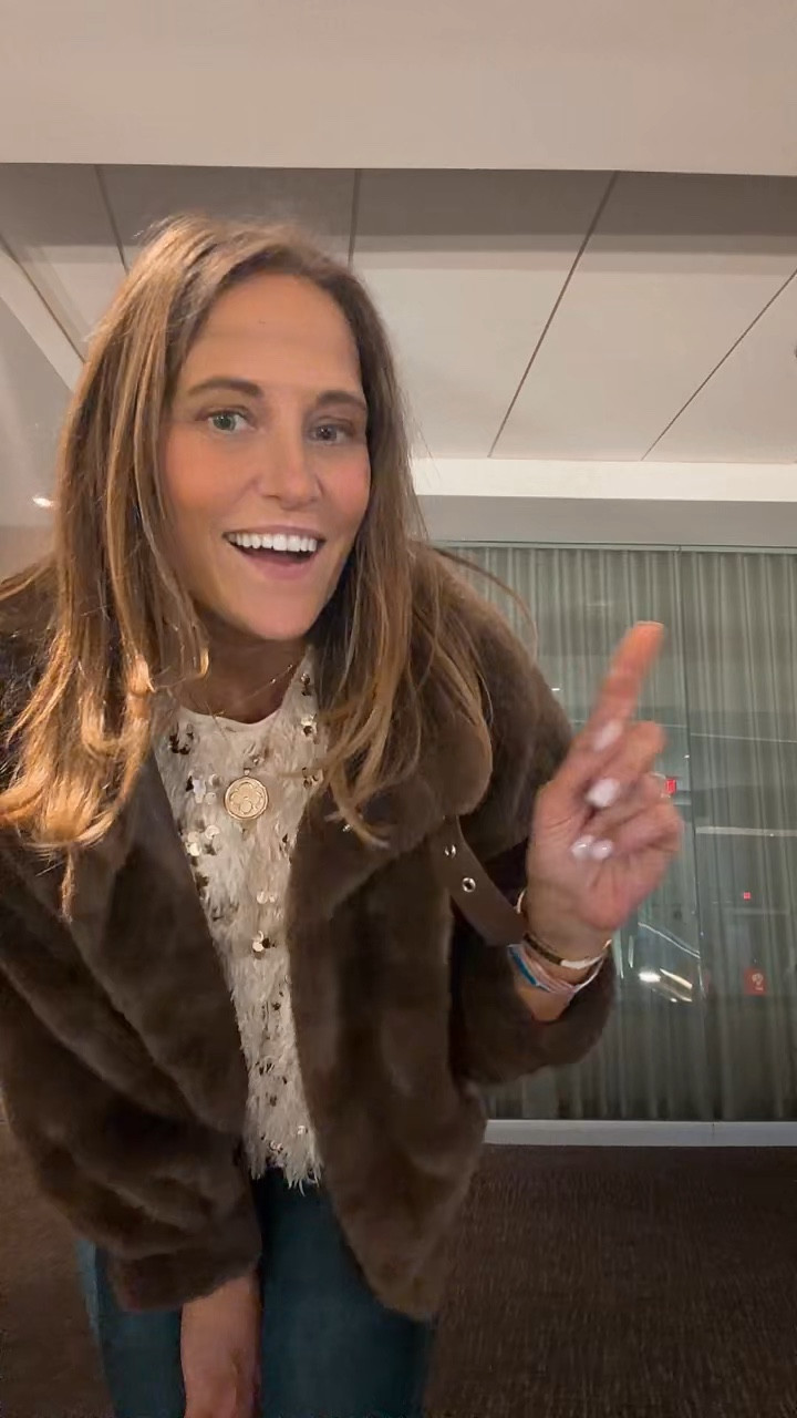 Jonas Brothers concert.  I’m obsessed with this feathered gold sequined top for going out and the holidays. Funnel neck tops are so on trend and this one is so warm and soft.  The buckle makes this one tops  

#LTKOver40 #LTKootd