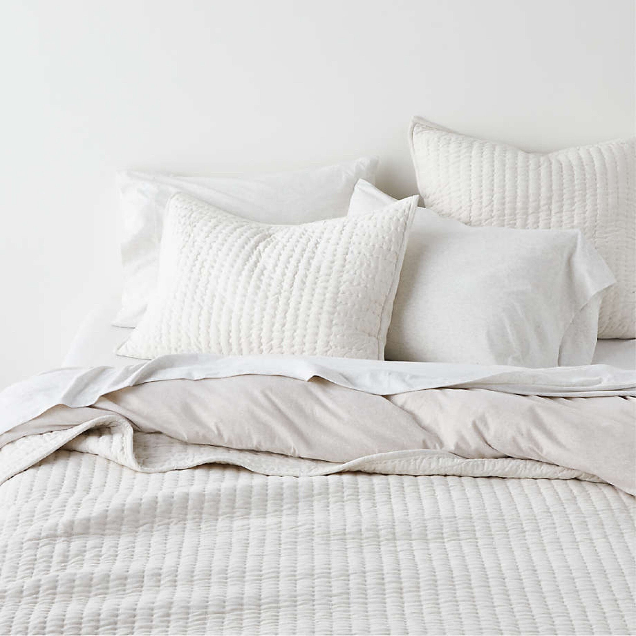 Cozysoft Organic Cotton Jersey Heathered Ivory King Quilt

Traditional kantha quilting gets a modern casual-yet-chic update in heathered ivory jersey. Softer than your favorite sleeping tee, the organic cotton fabric is stitched by hand into narrow channels for a dotted effect and a supersoft ribbed feel. The perpendicularly sewn border finishes our quilt with subtle linear contrast. For an ultra-inviting bed, add the matching pillow shams and coordinating sheet set and duvet cover.

#LTKhome #LTKMostLoved #LTKGiftGuide