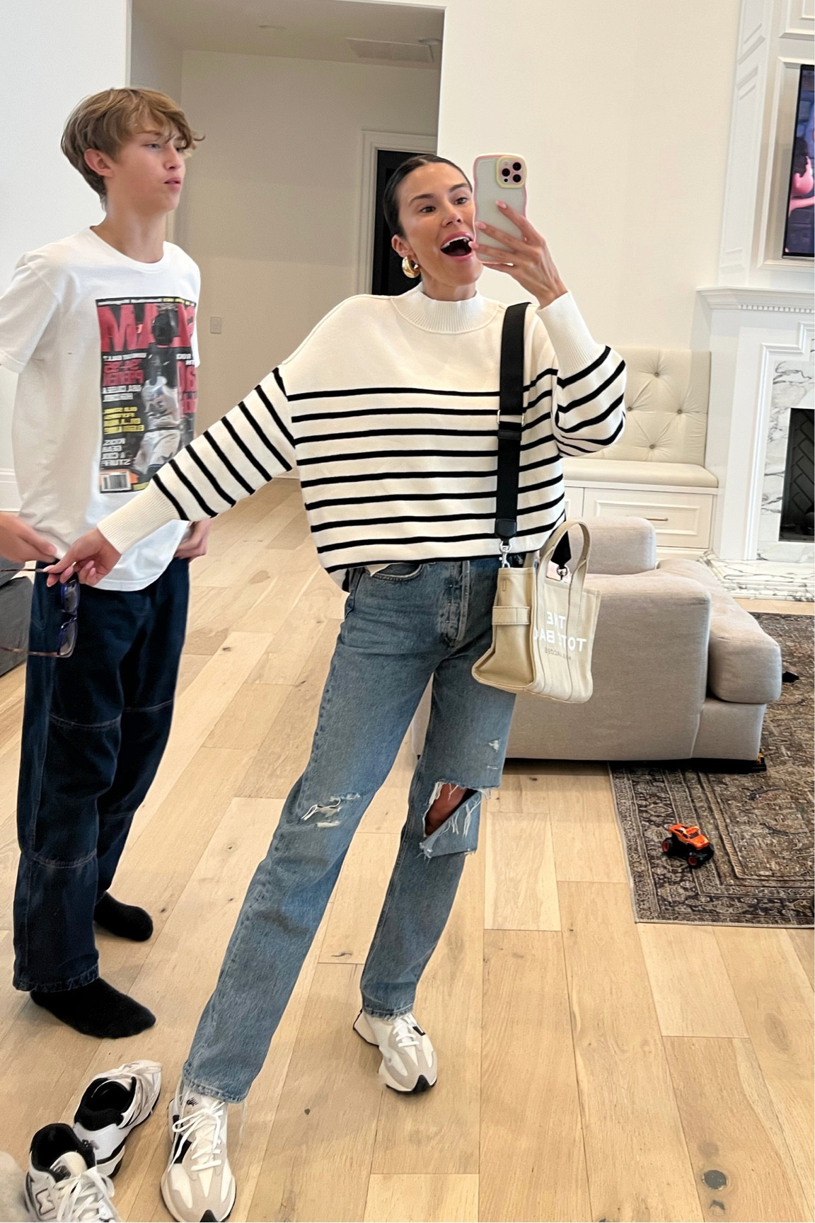 Casual mom style ✨ my striped sweater is under $50 and I’m wearing size small. The jeans run TTS! 

Spring outfit; casual style; casual outfit; school drop off outfit; striped sweater; agolde jeans; new balance sneakers; Marc jacobs tote; Christine Andrew 

#LTKstyletip #LTKunder50 #LTKunder100