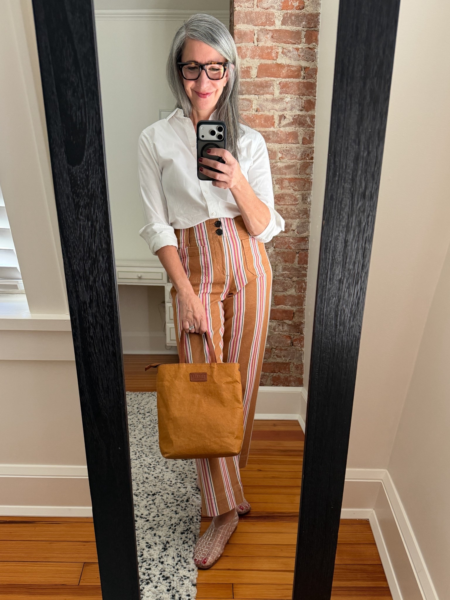 #ComfortableGirlSpring — warm weather basics that aren't "basic"

Winter had the plaid trousers. Spring gets these.

The stripes are surprisingly versatile — white for all of my tees, tanks and shirts, brown for bags and sweaters, blue for my beloved denim shirt. One pair of pants, a whole wardrobe.

Clear jelly flats, because the pants are already the point. (and seriously, how cute?)
.
.
.
.
#Over60Style #StyleOver60 #EverydayStyle #ModernStyle