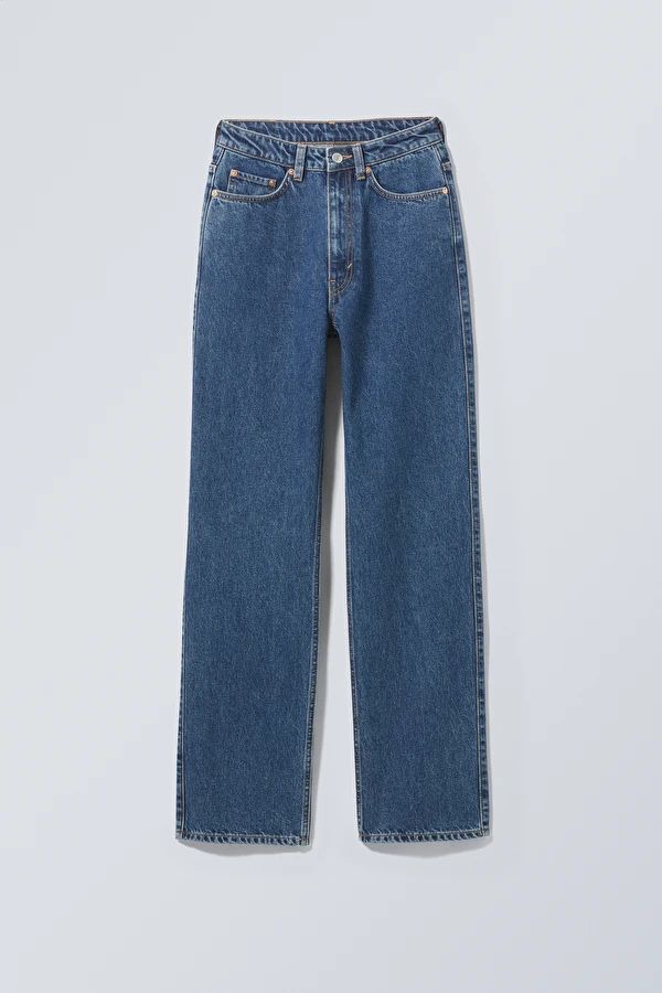 A pair of extra high waist straight leg jeans made from a rigid organic and recycled cotton denim... | Weekday