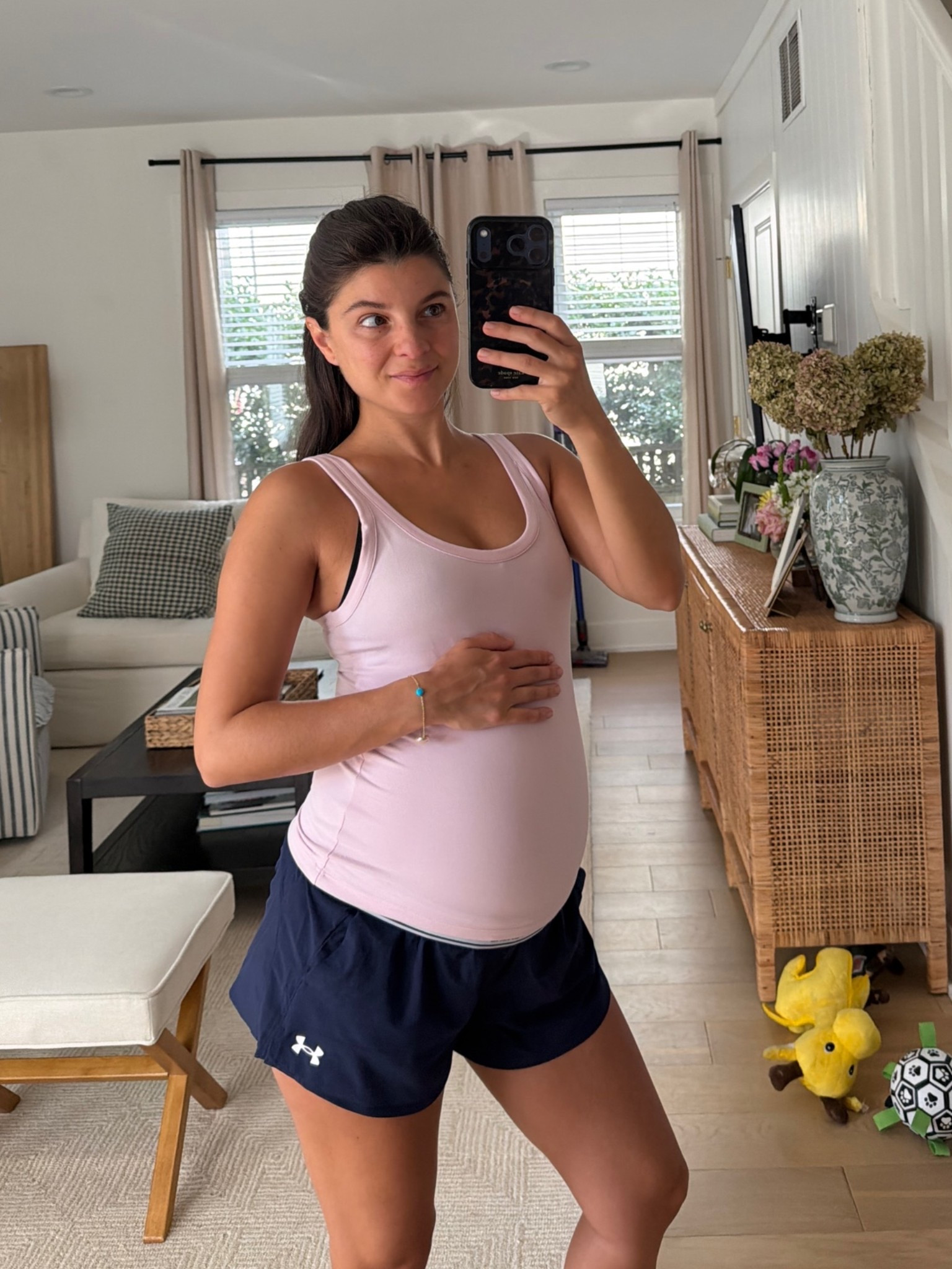 [6/15/26] morning workout ootd | full outfit is @underarmour | wearing medium in top + bottom at 37 weeks! Code VIV20 for $ off full price items. Top is already on sale for 15% off but shorts are available in other colors with code!!

#LTKSaleAlert #LTKActive #LTKBump