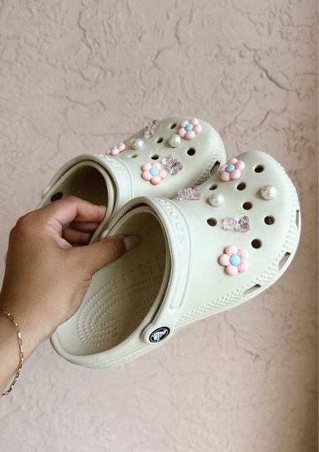 Girls crocs for summer 🤍🤍🤍

#crocs #croccharms #jibbitz #shoecharm #kidsshoes #girlsshoes #summershoes #beachshoes #poolshoes #toddlershoes #watershoes 

#LTKswim #LTKtravel #LTKfamily