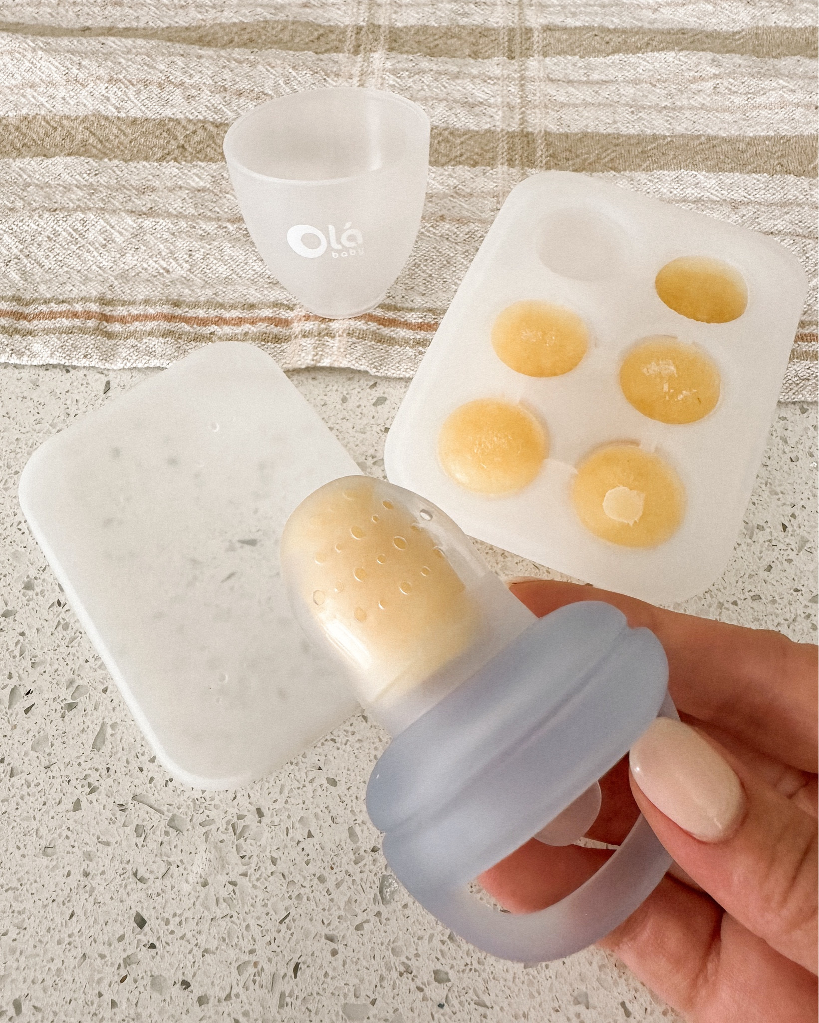 #1 Baby Led Weaning must have product!
Ola Baby silicone feeder is a necessity for BLW.

The @olababy silicone feeder is an absolute must have for any parent starting baby led weaning.
The freezer tray is perfect for freezing breast milk, fruit and veggie purées into the perfect size to fit into the feeder.
The teether is perfect for little hands to grip. My kids have LOVED these when they are teething, especially with frozen breast milk to sooth sore gums.  #OlababyFeederJourney #BabyLedWeaning #TeethingRelief #Olababy

#LTKFamily #LTKKids #LTKBaby