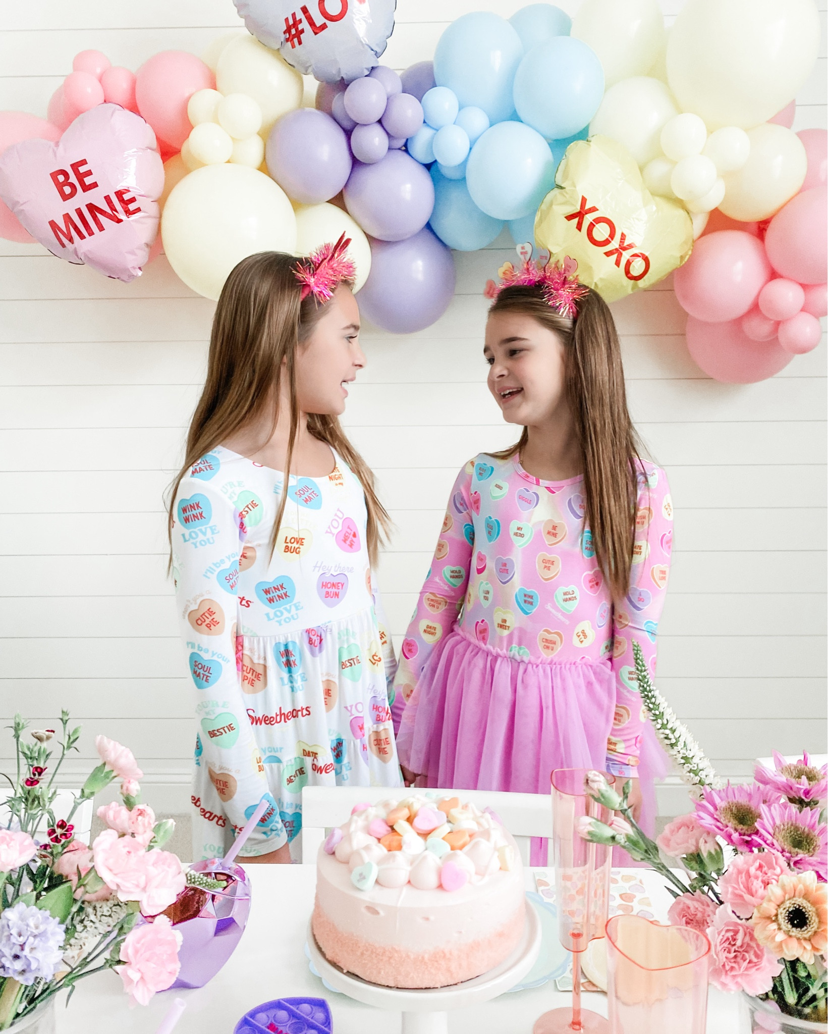 When your outfit matches the theme 🩷💜💛
#sweethearts 

#ltkfamily #ltkkids #sisters #family #mom #matchingfamily #matchingpajamas#bamboopajamas #kidsclothes #kidsfashion #valentinesdecor #valentinesgift #kidsparty #balloongarland #valentinesparty #lovemypbk#valentinesday #lovebasket #ltkparties  