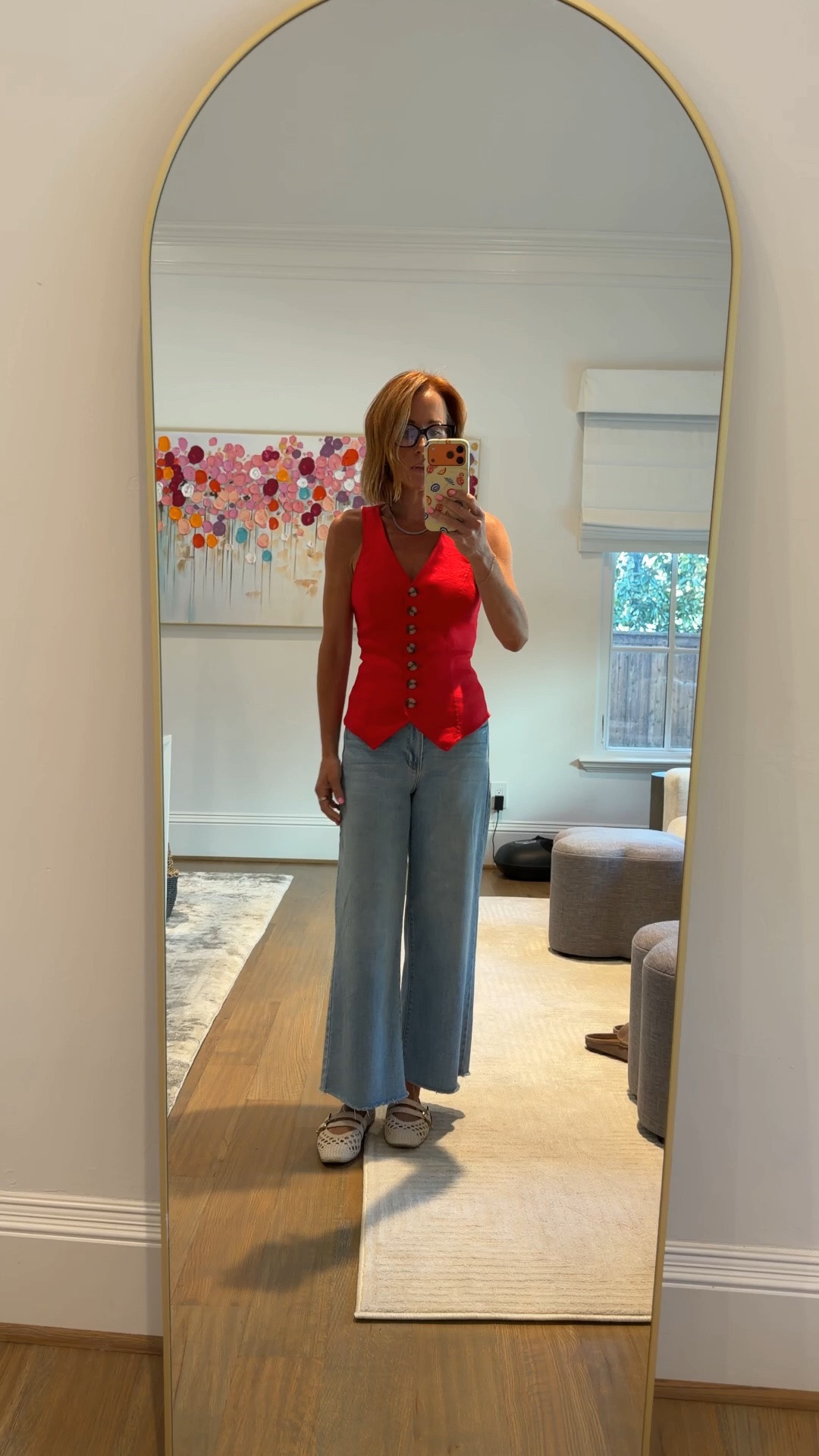 A red linen button front vest is one of those pieces that instantly makes a casual outfit feel like it was actually planned, and this Anthropologie red vest paired with Avara light wash wide leg cropped raw hem denim is one of my favorite summer outfits over 40 lately. The vest trend is still going strong and styling it with wide leg denim and Dolce Vita cream woven mary jane flats keeps the whole look grounded and wearable for everyday summer errands or a casual date night out. The turquoise beaded tennis necklace adds just the right pop of color to tie the red and light denim combination together without overpowering it.

#LTKootd #LTKOver40 #LTKPetite