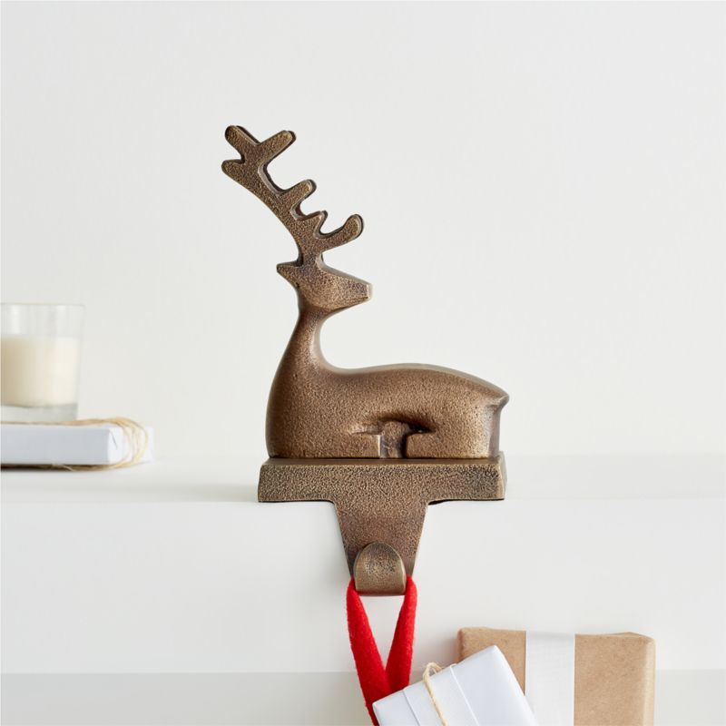 Brass Sitting Reindeer Christmas Stocking Hook + Reviews | Crate and Barrel | Crate & Barrel