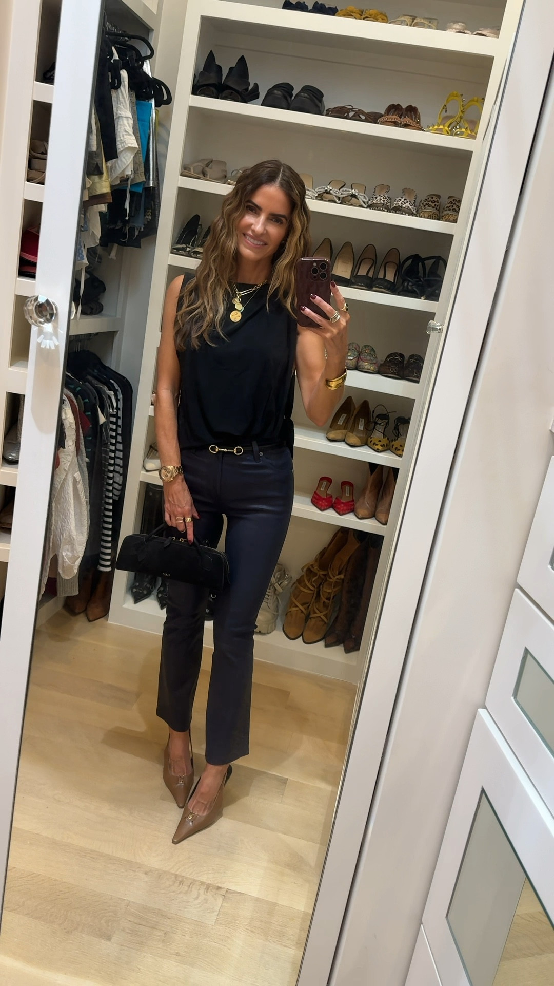 saturday night date night look of the night 🚨my navy leather pants come in 5 color ways & today is the last day to get 25% OFF!! 

they are incredible the fit is simply perfection! 

i sized down bc i like a tighter fit but if between sizes get your normal size (im wearing a 24) 

+ shop the oh so chic black blouse that also comes in 2 other colors & is also on sale rn! 

i’m wearing x-small runs big 

+ my fav bag & heels too! 


#LTKShoeCrush #LTKSaleAlert #LTKItBag