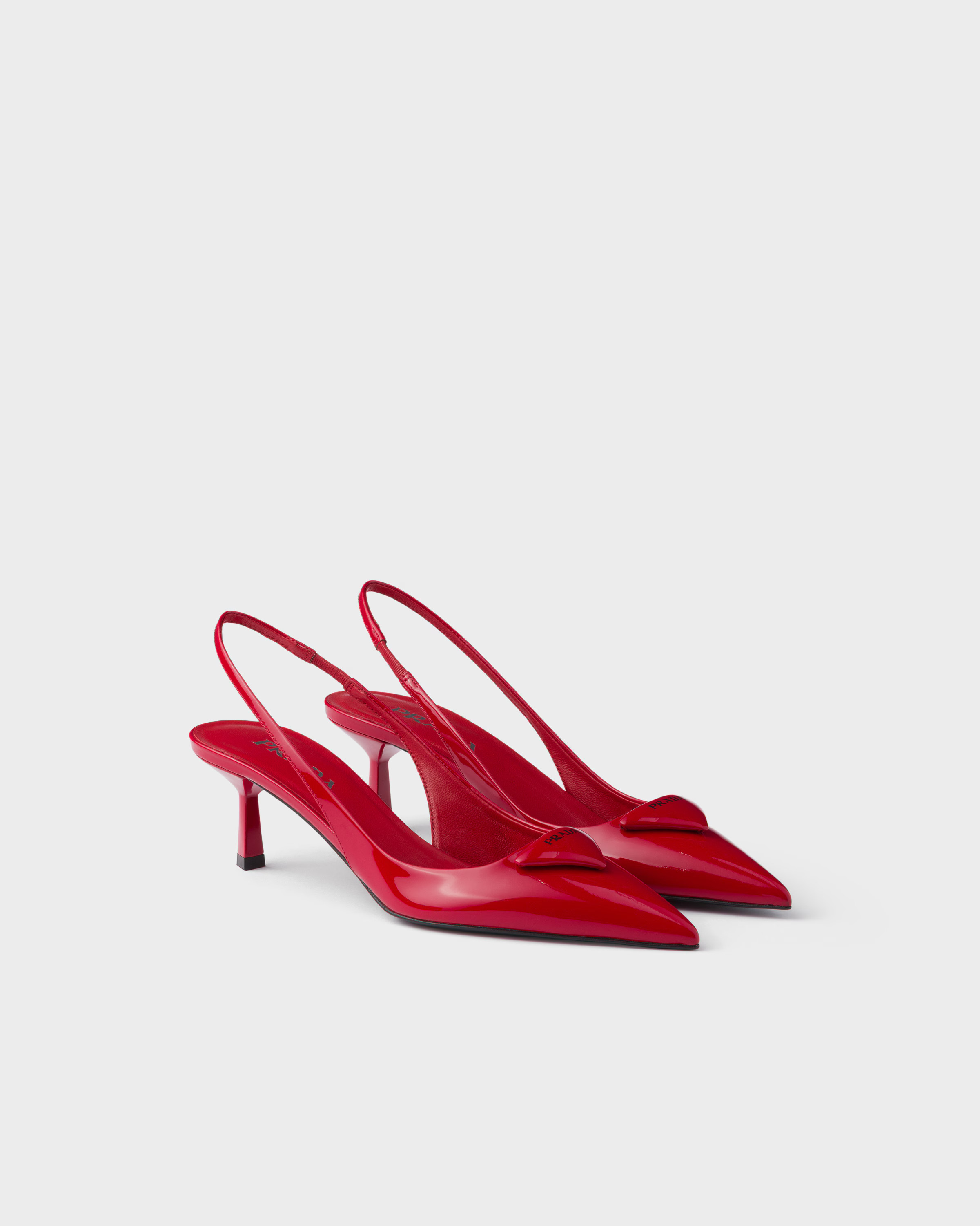 Patent leather slingback pumps | Prada US