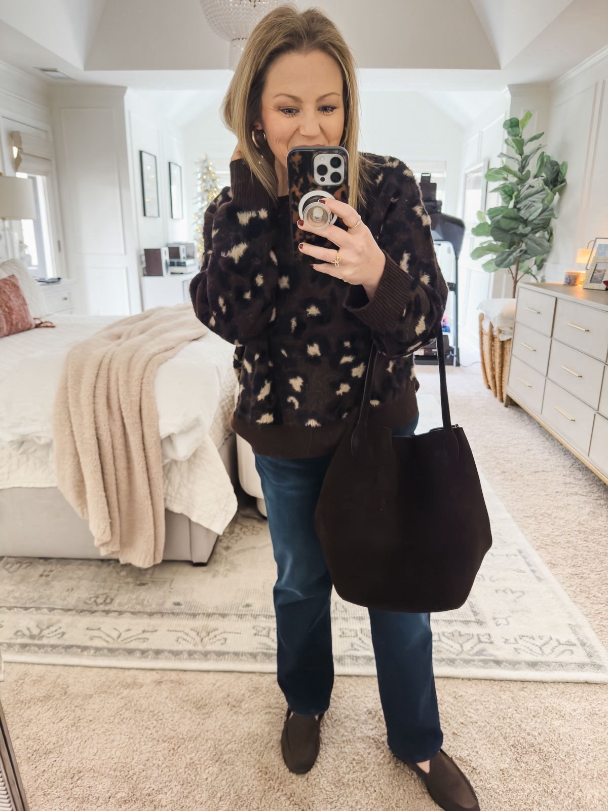 This cozy sweater is perfect for the season and any casual occasion, paired with my favorite jeans and suede loafers. casual outfit ladies blue jeans suede tote bag gift idea for her

#LTKdayinmylife #LTKOver40 #LTKFindsUnder50