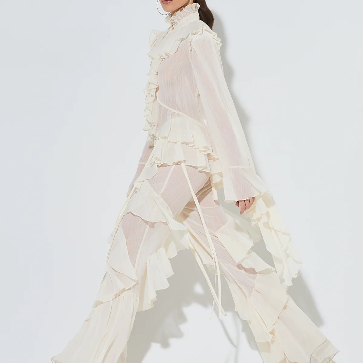 CELIA Cream Ruffle Flared Trousers | Noughts and Kisses