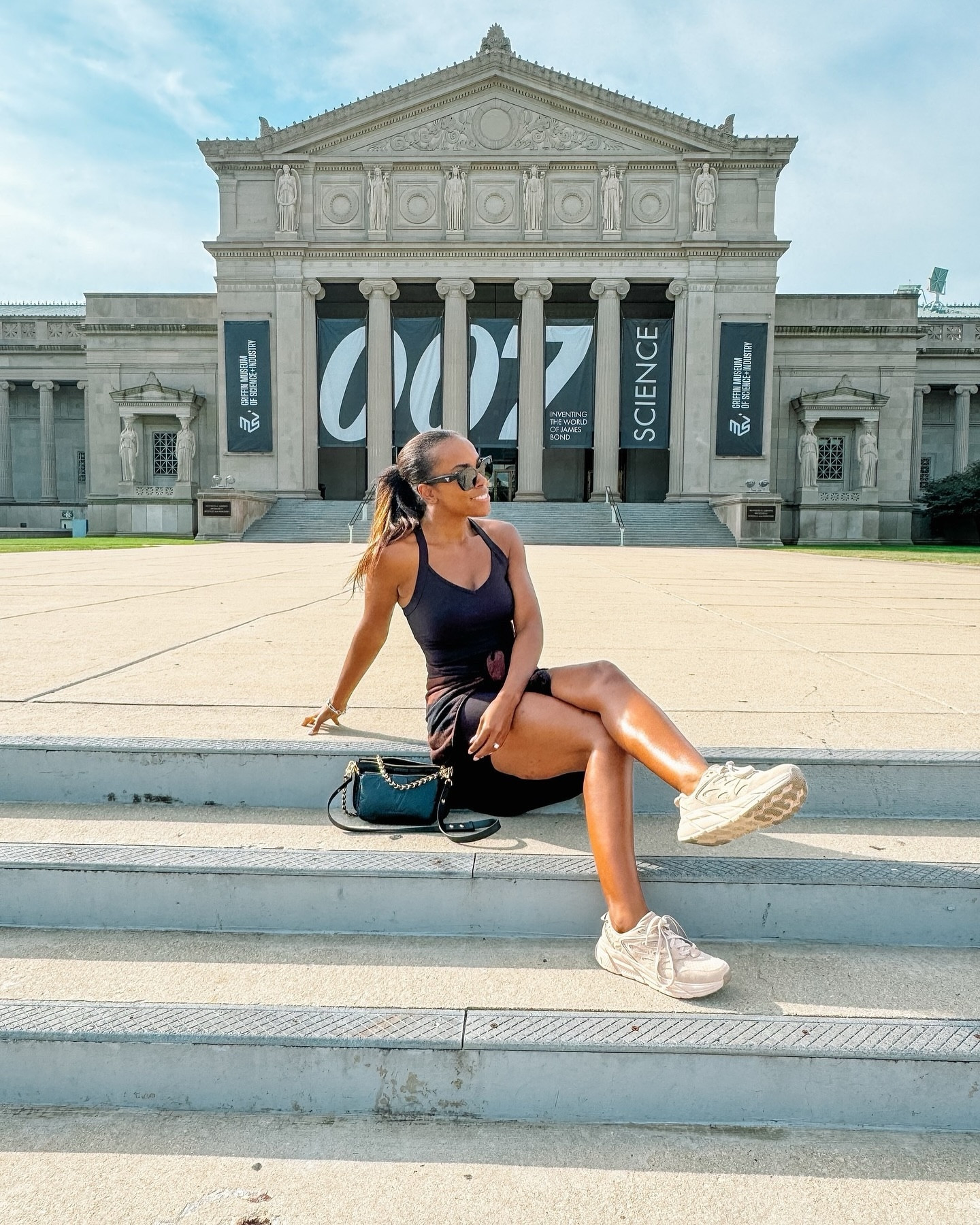 Plot twist: I wasn’t just sitting outside the Museum of Science and Industry...I was on a secret mission (obviously). 🕵🏾‍♀️

If I wasn’t a lawyer and influencer, I’d be saving the world in Prada sunnies and Hokas. 🕶️🍸⁠
⁠
But seriously...I might just save that for my Halloween costume… 👻what do you think—should I go full 007 this year or stick to scaring off bad fashion? 

💭 Drop your costume ideas below-spooky vibes only, ha!⁠
⁠
xo⁠
⁠
outfit details |⁠
shoes - @hoka ⁠
jumpsuit - @aerie 
flannel - @aerie 
makeup - @rarebeauty 
bag - @louisvuitton always ;)
.⁠
.⁠
.⁠
#BondGoals #MuseumOfScienceAndIndustry #ChicagoVibes #JamesBond #PradaSunglasses #HookaShoes #AthleisureStyle #ChicagoInfluencer #HalloweenFun #InfluencerLife #ChicInTheCity #FallFashionVibes #HalloweenCostumeIdeas #FashionInspiration #hoka #aerie #aeriereal⁠
⁠
James Bond, Halloween vibes, Museum of Science and Industry, fashion inspiration, influencer life, gym shoes, Prada sunglasses, funny Halloween caption, Chicago