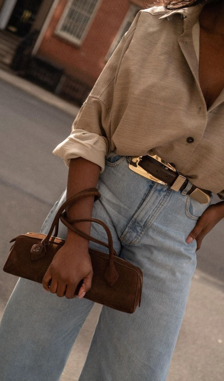 This timeless outfit pairs relaxed light-wash jeans with a soft neutral blouse and rich brown leather accessories for an effortlessly elegant everyday look.
Classic textures like leather, gold hardware, and structured denim create a polished outfit formula that feels refined, minimal, and endlessly wearable. 

 #LTKootd #LTKmomlife