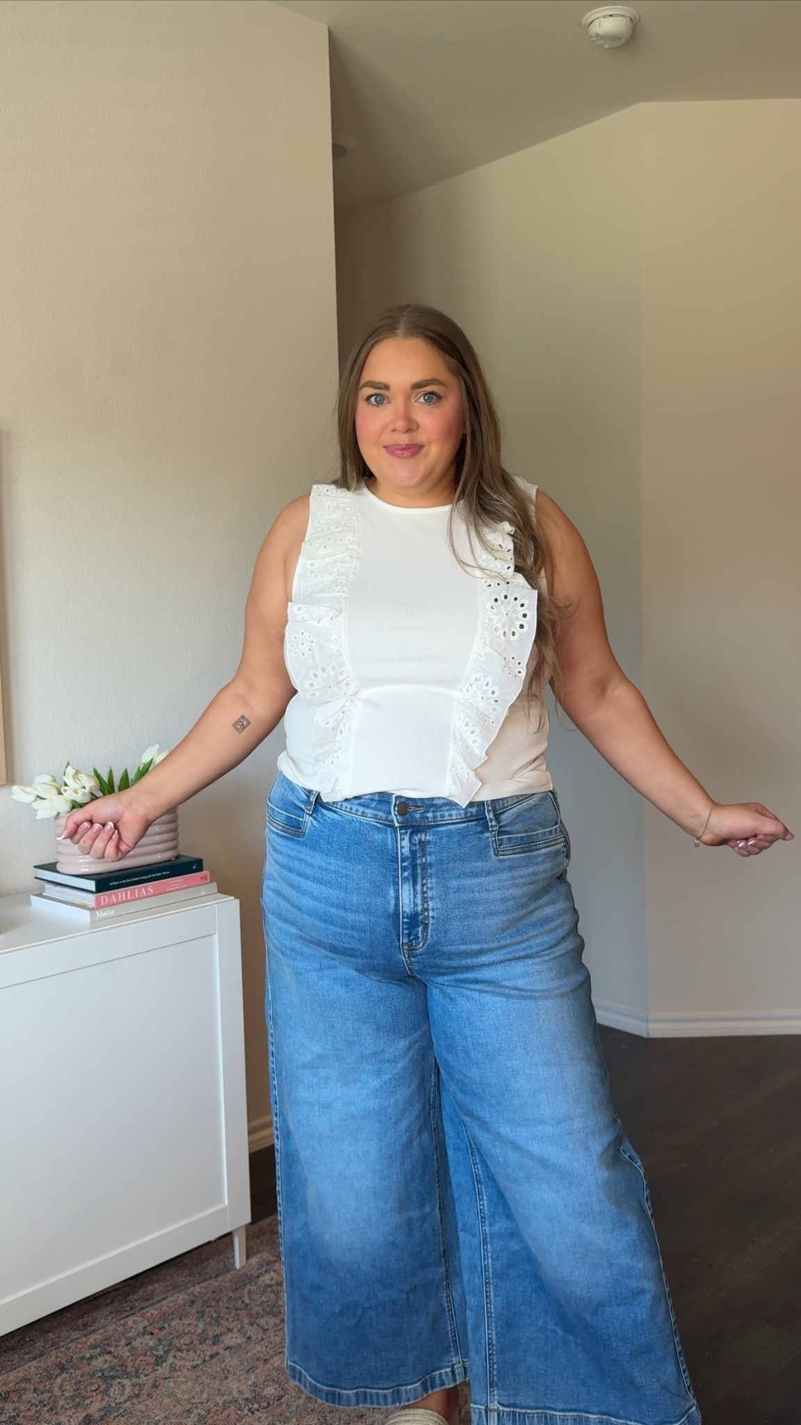Plus size spring outfit wide leg jeans and ruffle top. Wearing 18 in jeans and size 2 in ruffle tank 

#LTKSeasonal #LTKPlusSize