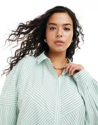 ASOS DESIGN Curve spliced detail volume shoulder shirt in green stripe | ASOS (Global)