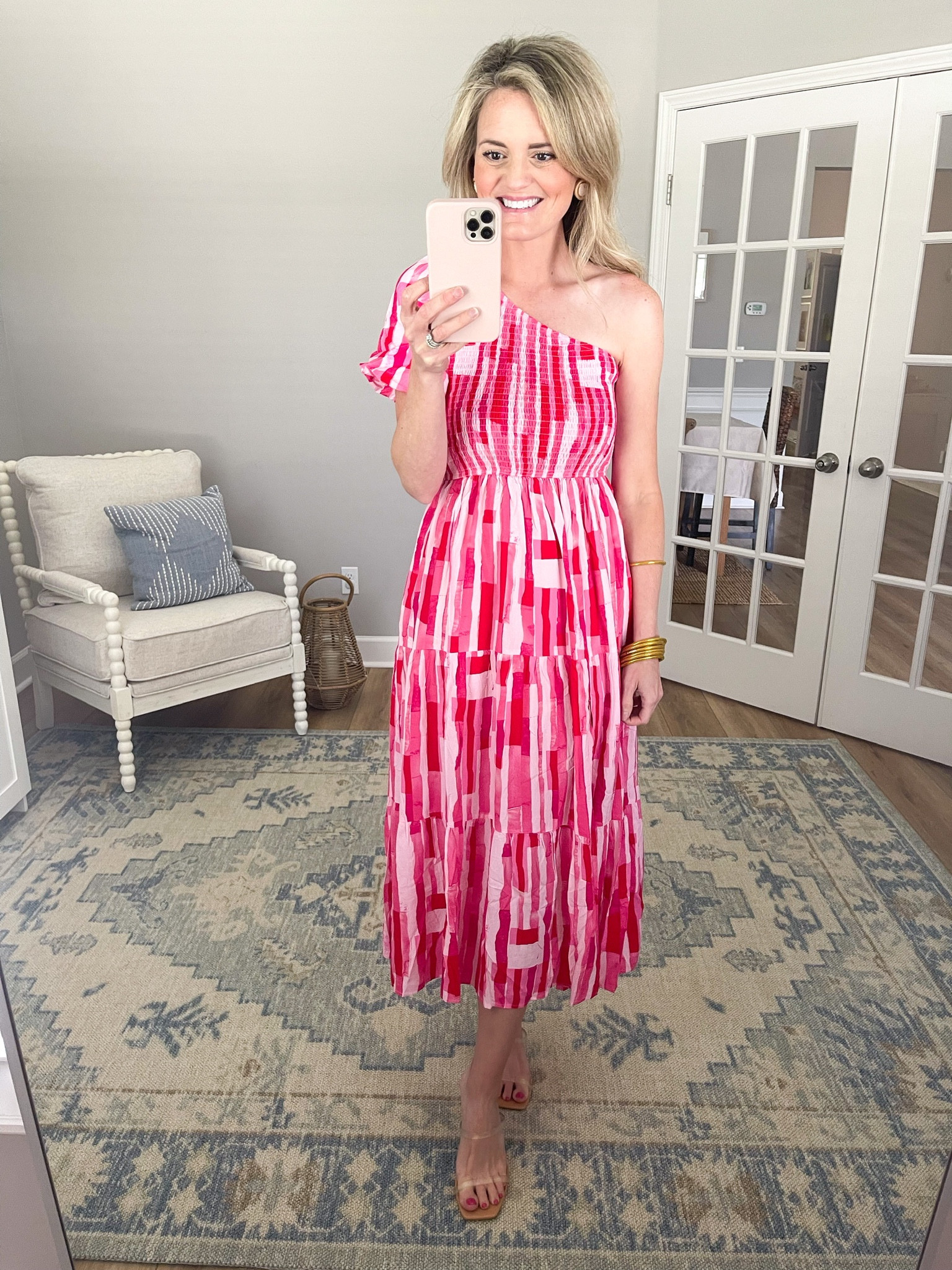 The color and pattern in this one shoulder midi dress are so vibrant! I adore the puff sleeve on the shoulder and smocking around the top.  There is an unexpected slit up the side.  I think this would be so fun for a vacation or summer wedding.  I am wearing the size small.

#LTKwedding #LTKstyletip #LTKunder50