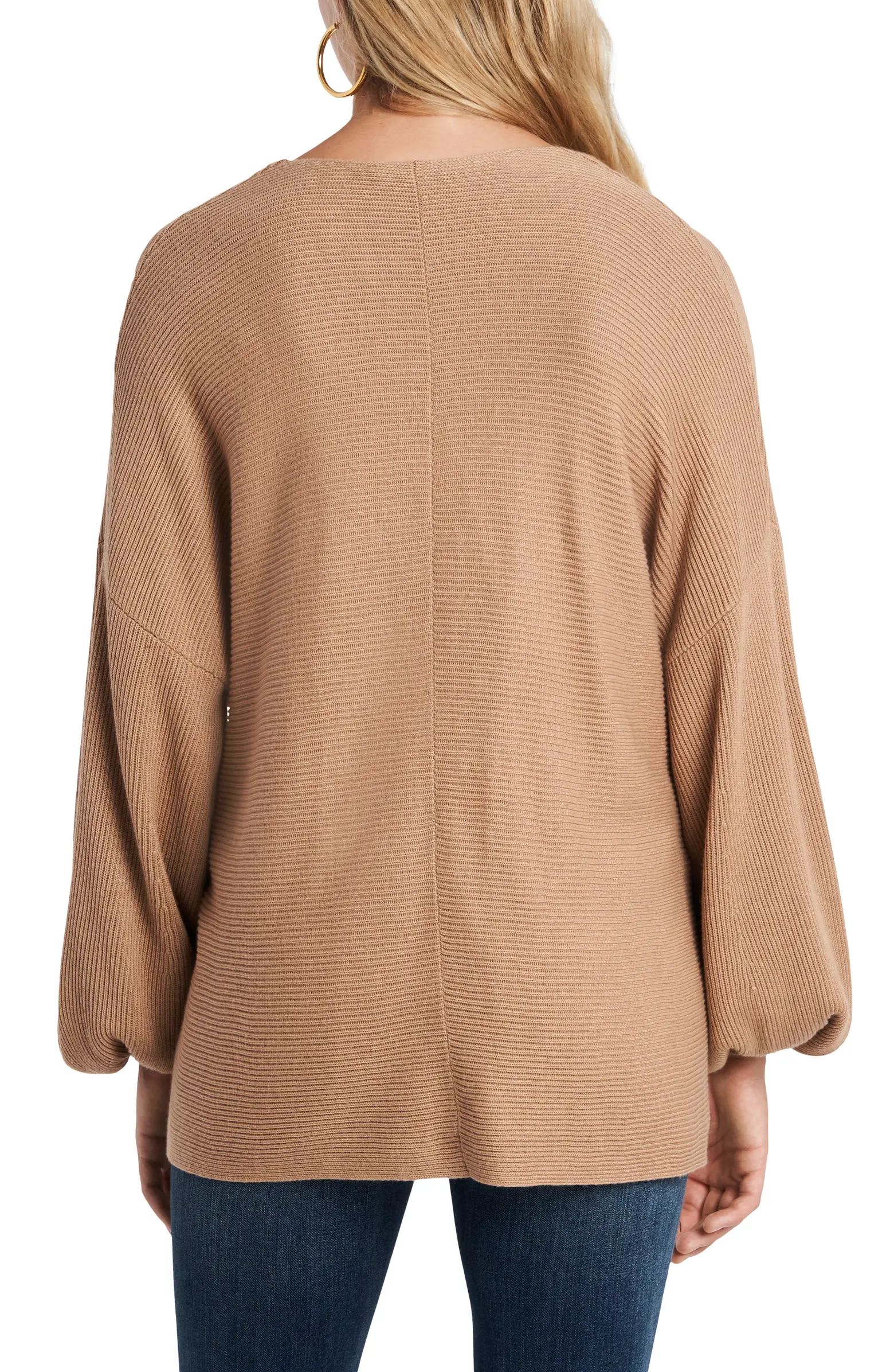 In this trend-right cotton-blend sweater, a dropped shoulder enhances the dramatic balloon sleeve... | Nordstrom