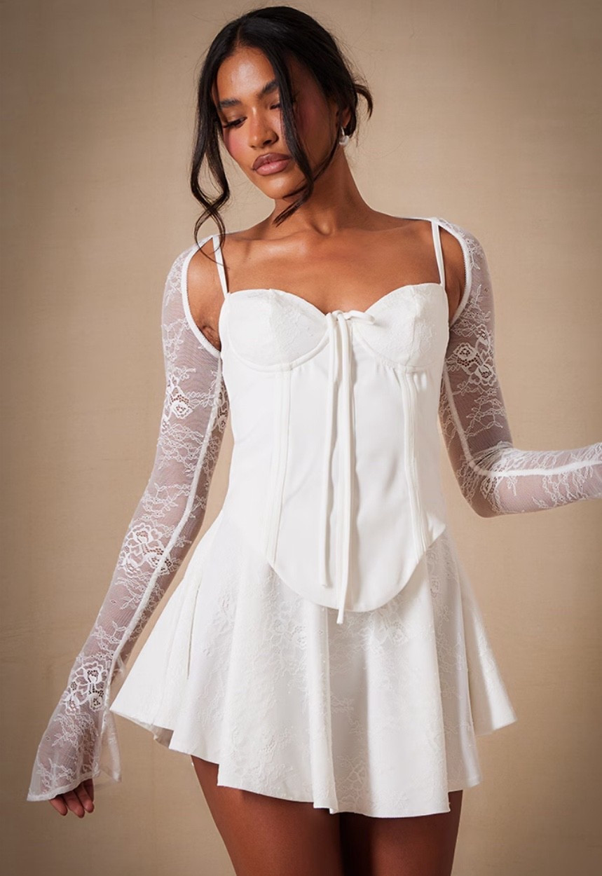 White corset mini dress!  So super cute!  

#LTKStyleTip #LTKFindsUnder50 #LTKSaleAlert