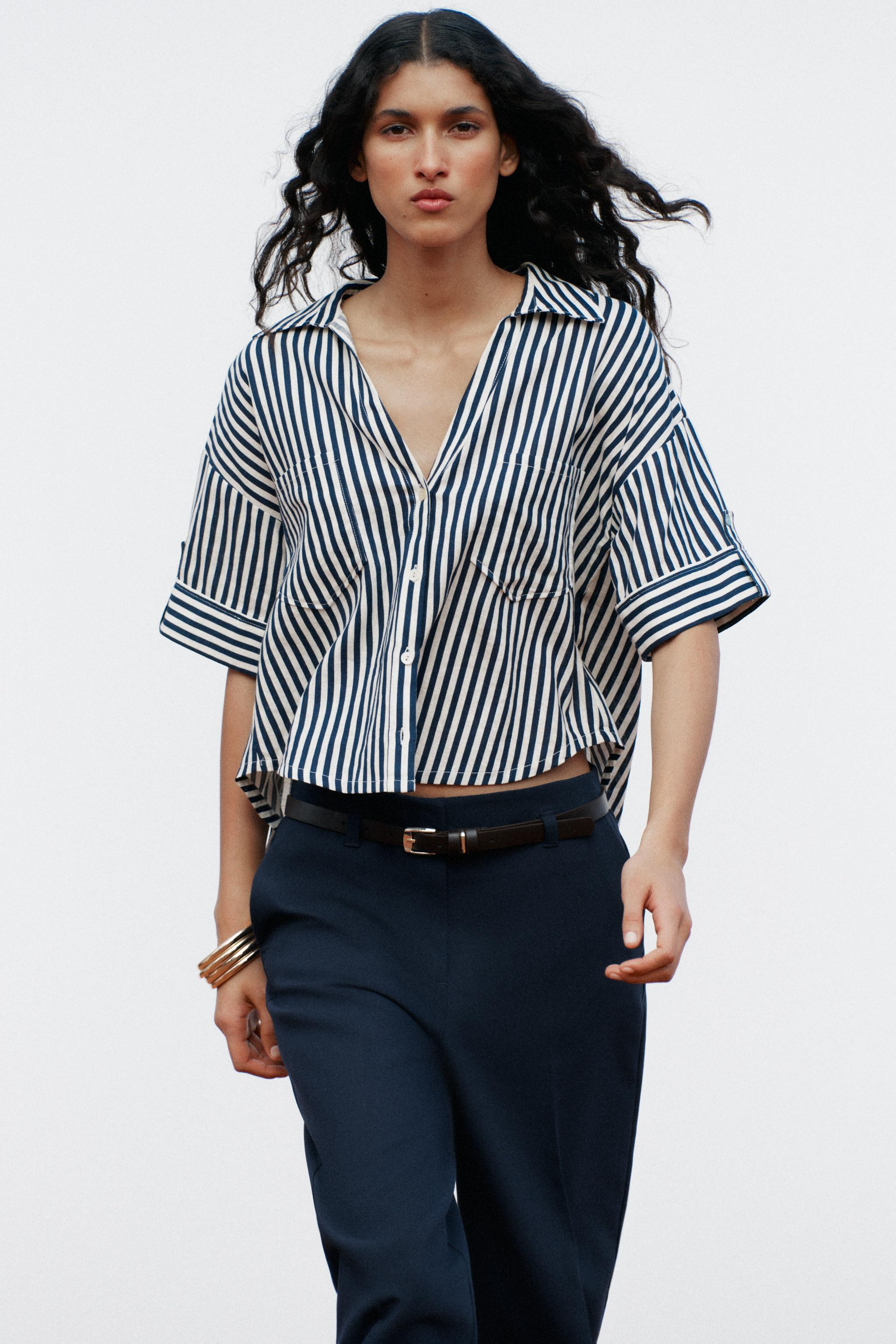 Linen shirt. Lapel collar with V-neck and short sleeves. Front patch pockets. Front button closur... | Zara US