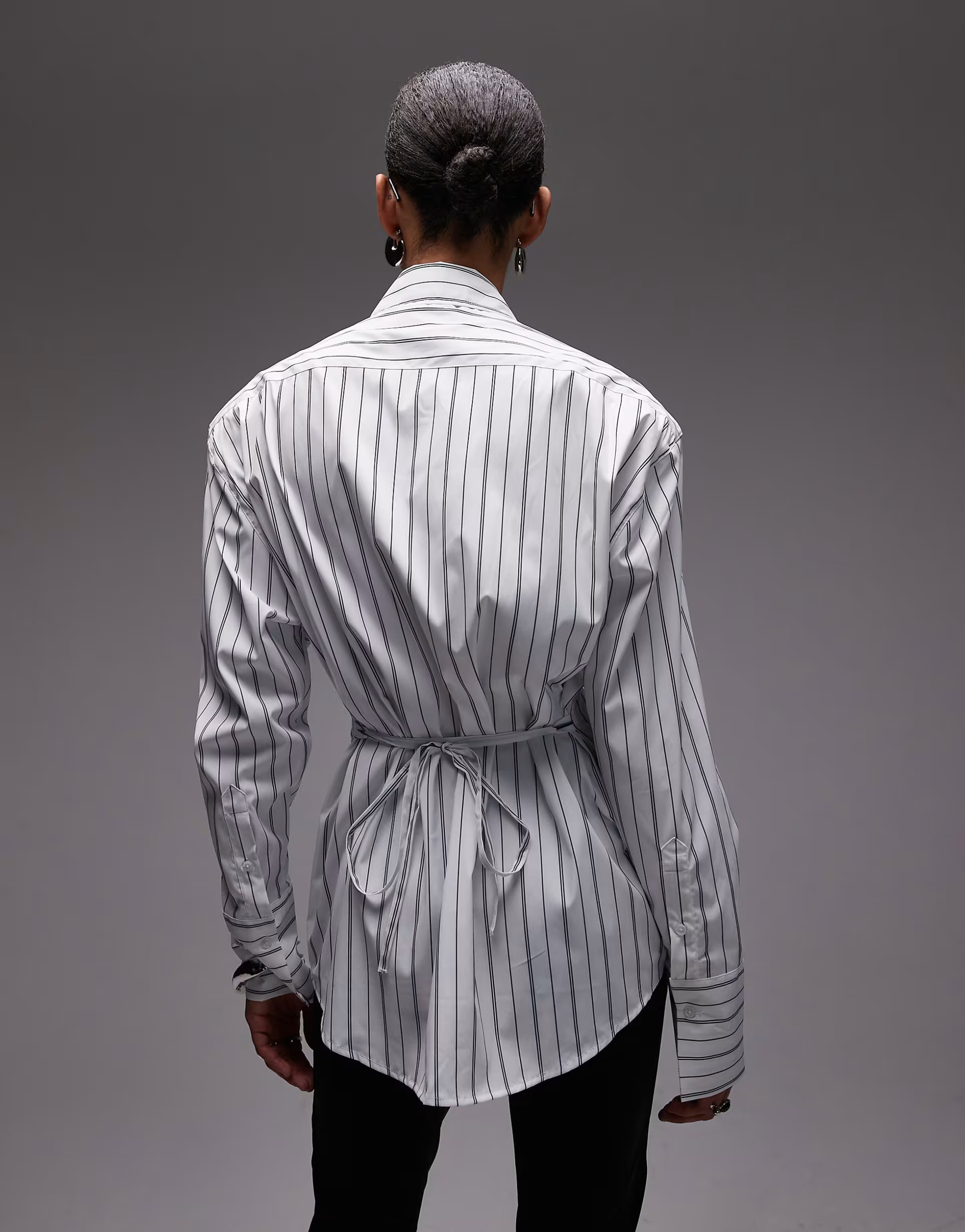 ASOS DESIGN cinch shoulder pad shirt with tie back in black pinstripe | ASOS (Global)