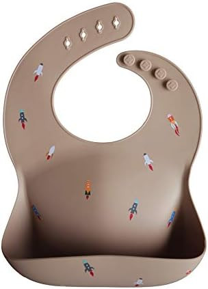 mushie Silicone Baby Bib | Adjustable Fit Waterproof Bibs (Rocket Ship) | Amazon (US)