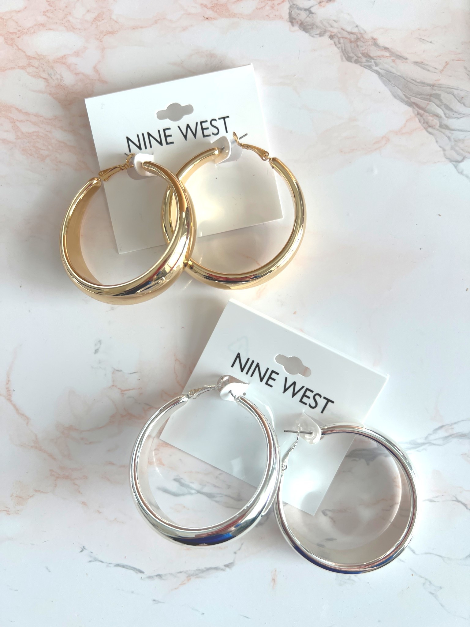 The best, big, slightly chunky, mega lightweight hoop earrings that I had to buy silver and gold!! 

#LTKBeauty #LTKgrwm #LTKootd