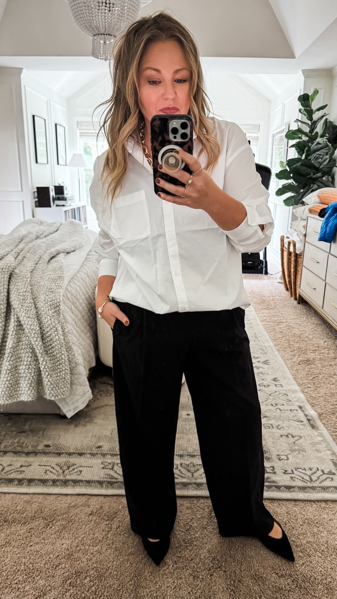 A white shirt and black trousers will always be in style and are ideal for any occasion, from work to a date night. I’ve added my black suede slingback flats for a dressier look. Kid, all three are currently on sale and also come in other color options. work outfit date night outfit women’s outfit dress pants

#LTKFindsUnder50 #LTKSaleAlert #LTKStyleTip