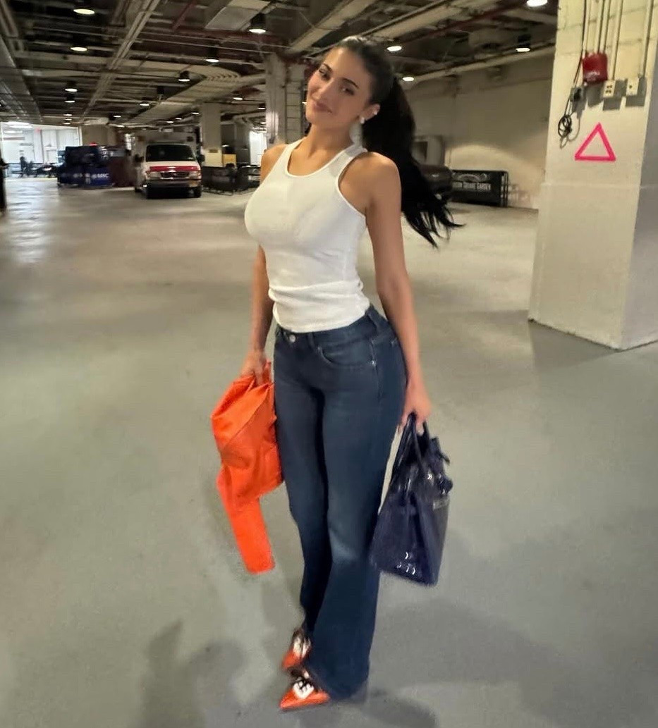 Kylie Jenner's  Low Rise Bootcut Jeans and perfect classic white ribbed tank top ￼