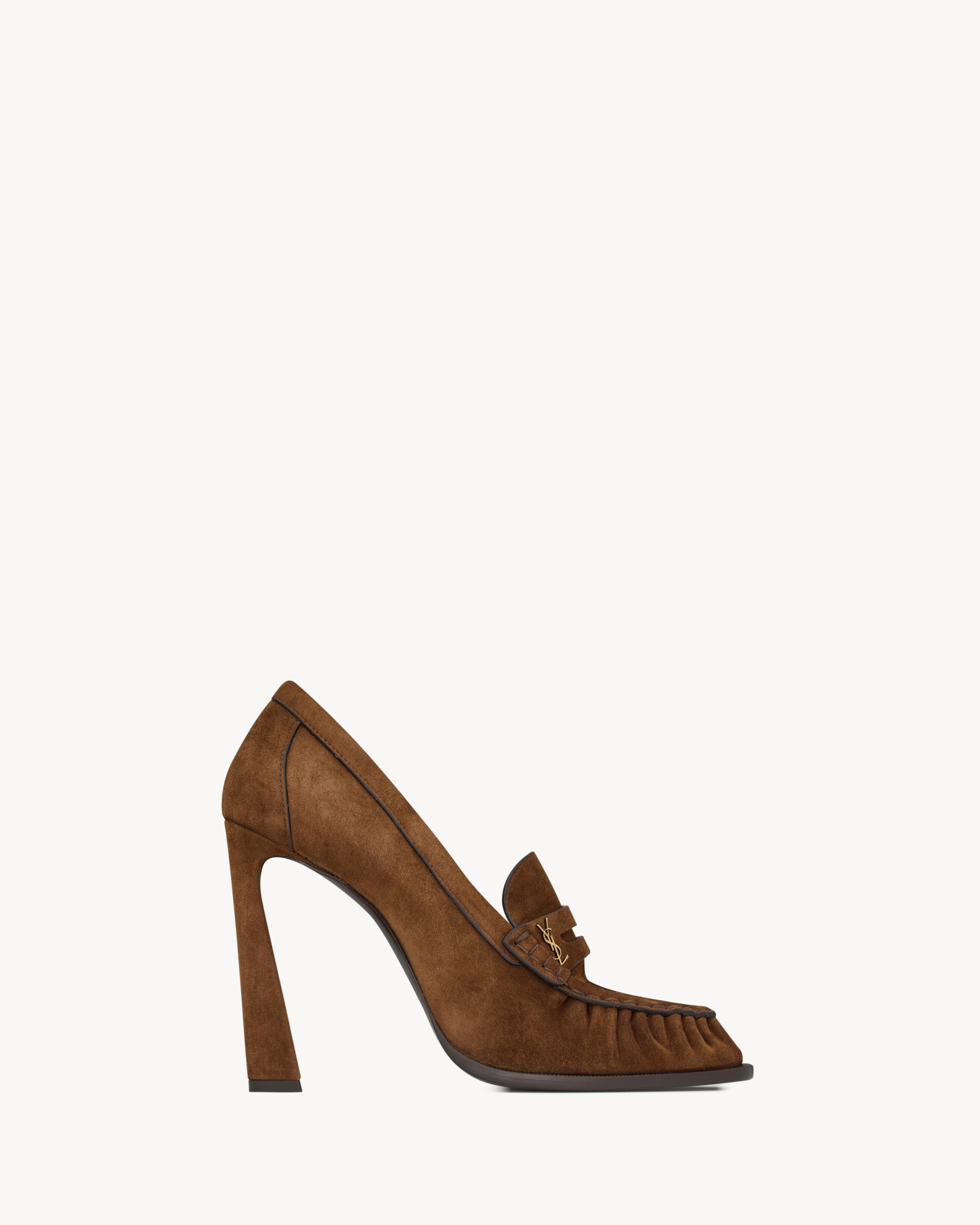 supple penny loafer pumps decorated with the CASSANDRE, featuring a hand-stitched moc toe and L h... | Saint Laurent Inc. (Global)