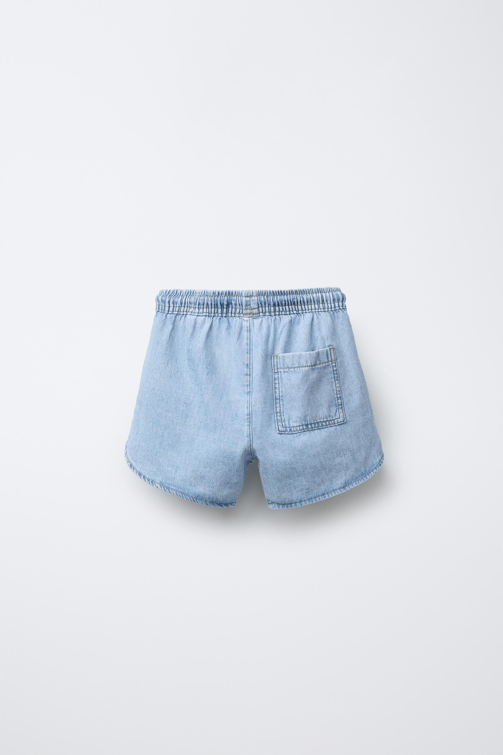 Denim shorts with elastic waistband and adjustable front drawstring. Front pockets and back patch... | Zara US
