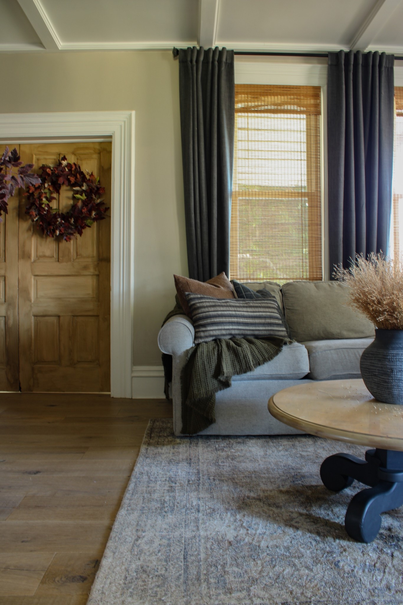 Fall Decor Living Room

Moody Throw Pillows | Dark Gray Curtains | Wooden Bamboo Blinds | Realistic Fall Wreath | 

#LTKHome #LTKSeasonal