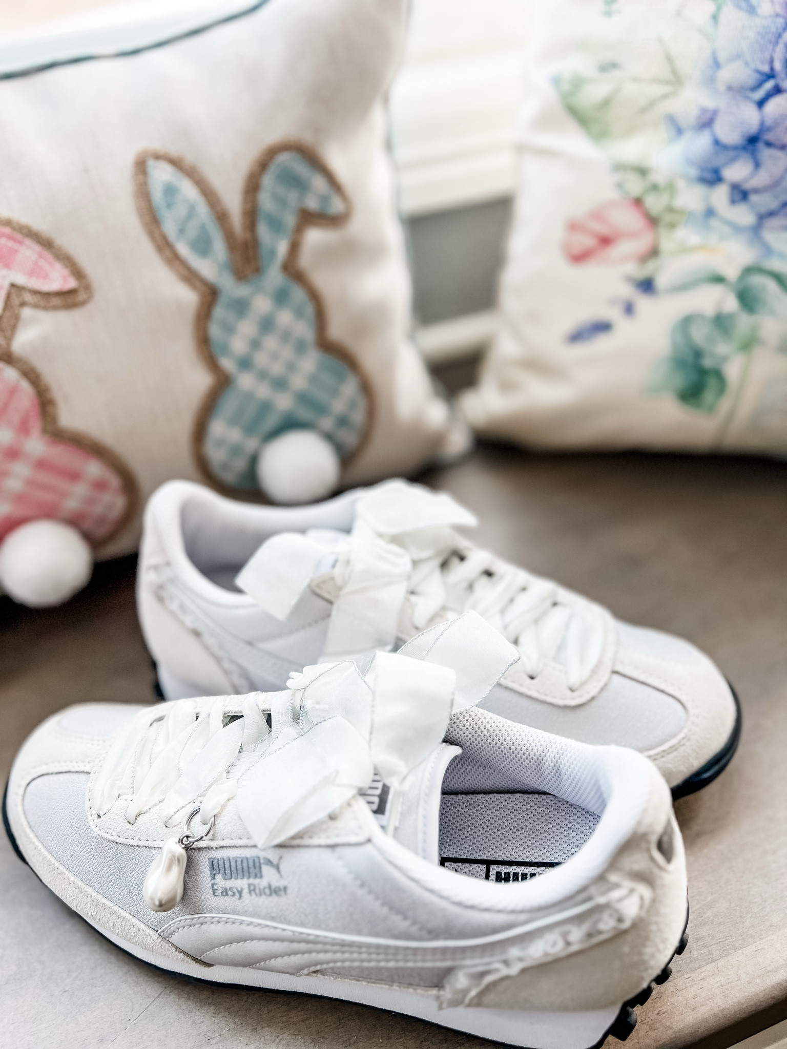 Girly sneakers for spring!
I love the pearl charm and the sneakers have ribbon laces and ruffle detailing on the sides. 
Spring shoes, bow sneakers, girly, girly outfit, women’s shoes, women’s sneakers, white sneakers 

#LTKShoeCrush #LTKFindsUnder100