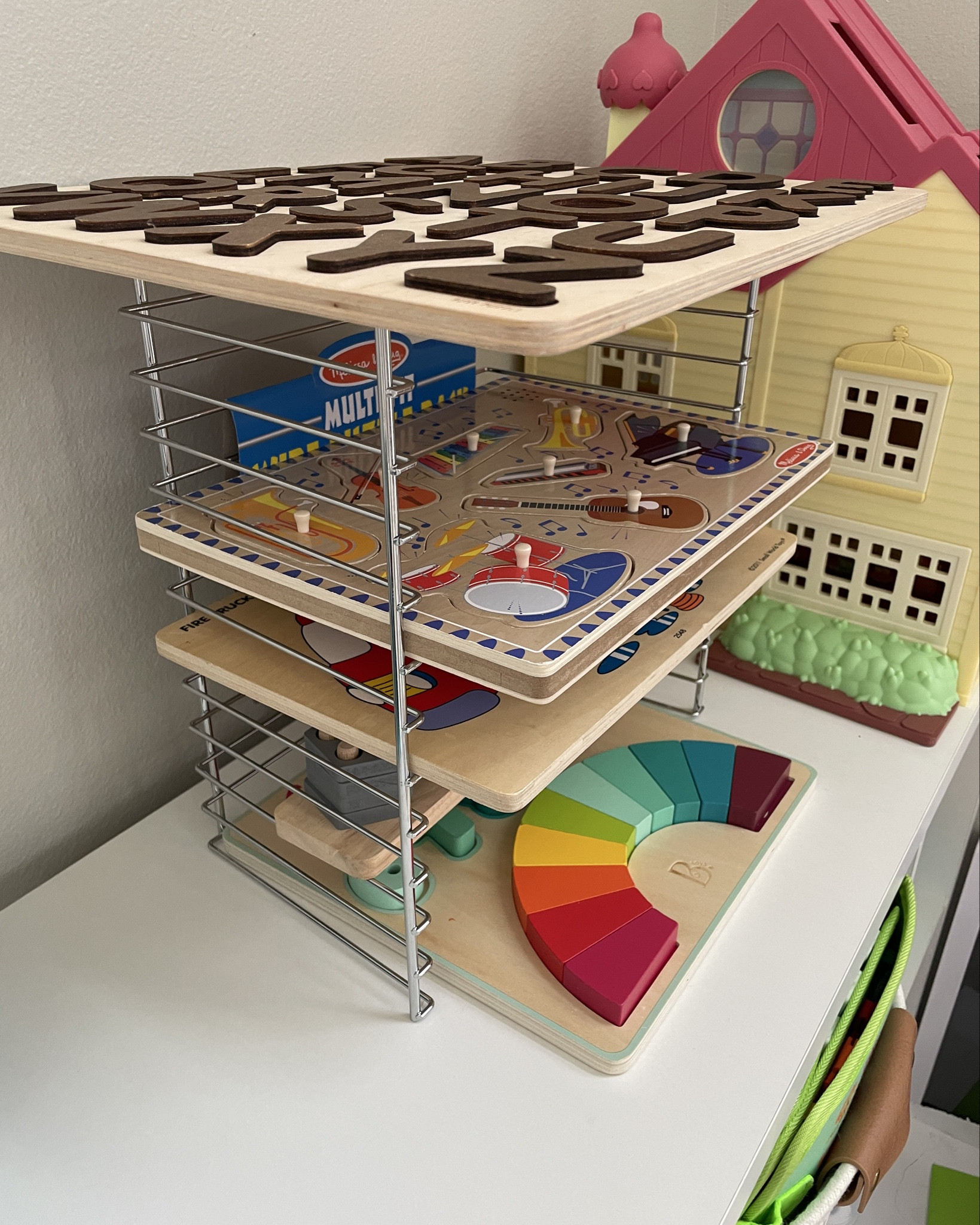 Wire puzzle rack
This is the multi fit, fits most of our chunky puzzles 


#LTKHome #LTKKids