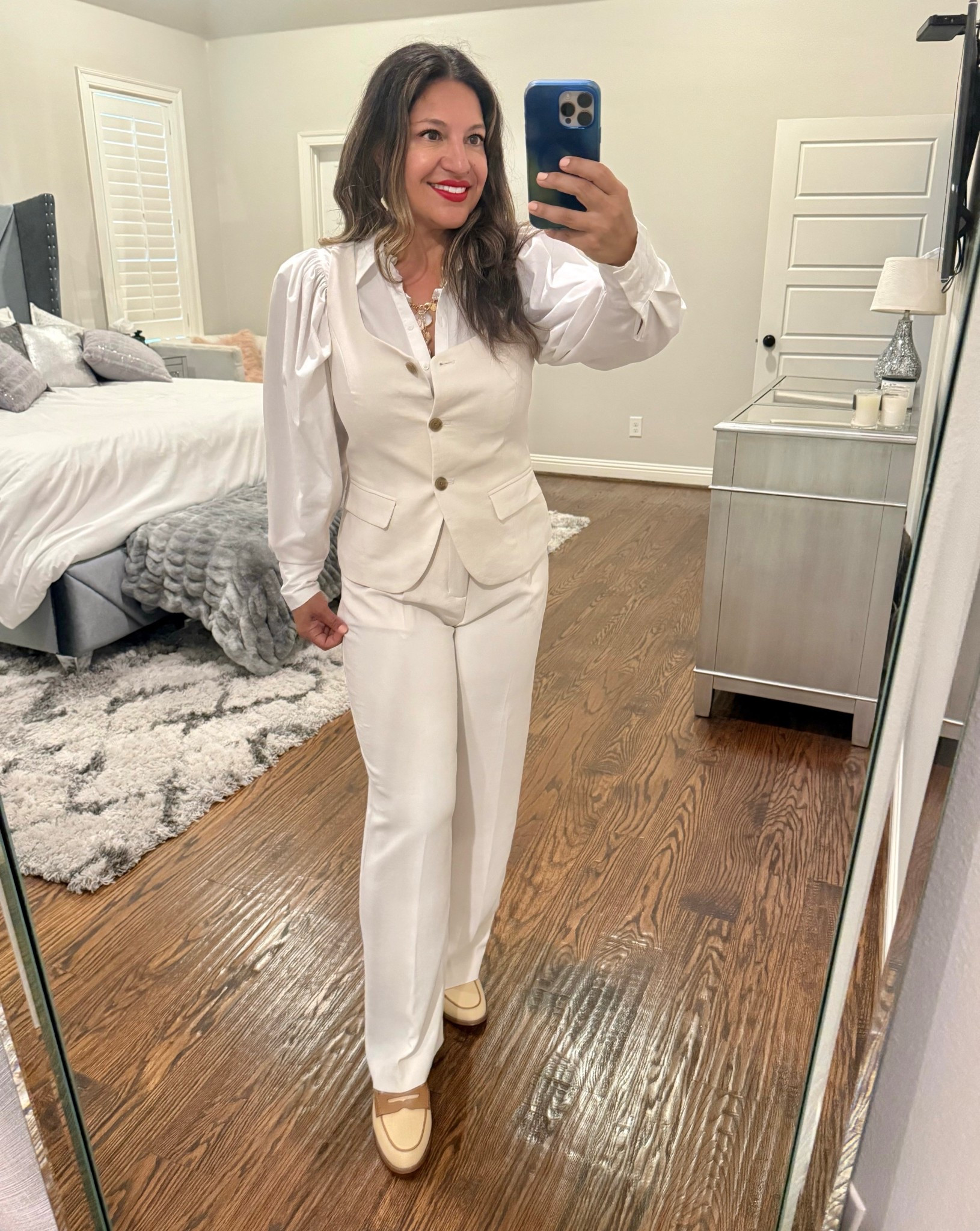 When winter white enters, you open the door! Target did not disappoint on this outfit! The crepe pants have elastic in the back for comfort but look polished in the front. 

The vest runs small, so I am in a medium and size 6 regular in the pants. 

#LTKStyleTip #LTKWorkwear #LTKFindsUnder50