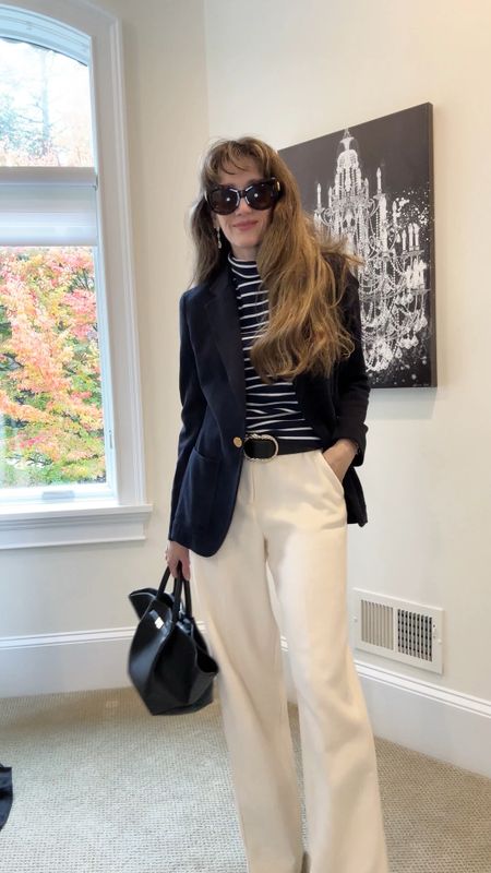 The power of a capsule wardrobe! Easy pieces for work outfit that are classic and elegant! Navy blazer, ecru or taupe trousers, stripes, statement belt, button downs, waistcoat vest, faux leather shorts, workhorse bag, bagboots! 

#LTKworkwear #LTKstyletip #LTKVideo