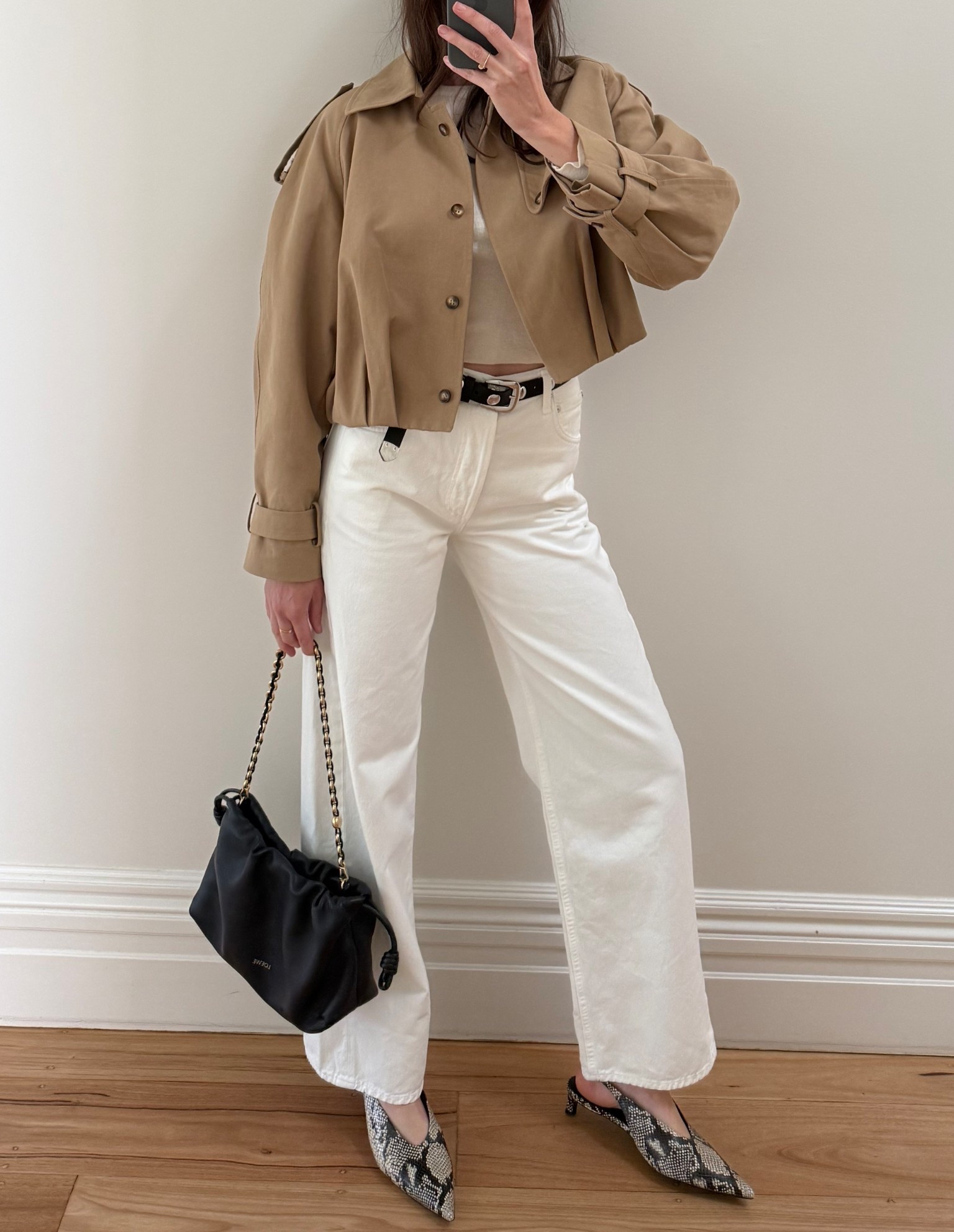 Autumn wine bar outfit 

High waisted baggy white denim 
Henne cropped trench 
Black Loewe leather bag 
Snake print kitten heels 

#LTKaustralia #LTKstyletip #LTKautumn