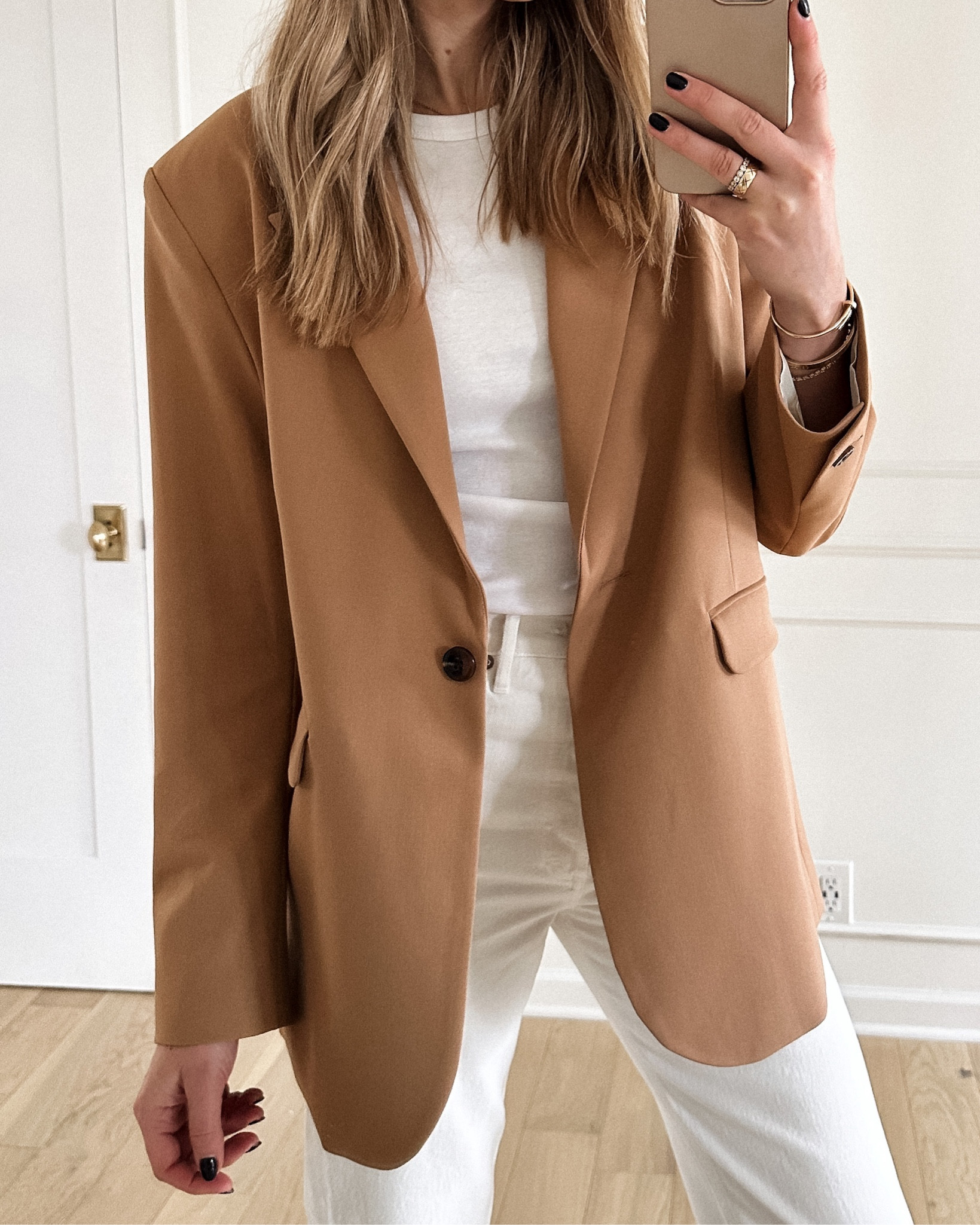 Fashion Jackson wearing camel blazer (small), white tee, white jeans, #fashionjackson #blazer #workoutfit #soringoutfits 

#LTKworkwear #LTKstyletip