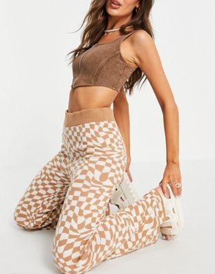 ASOS DESIGN knit flare pants in distorted checkerboard pattern in camel - part of a set | ASOS | ASOS (Global)