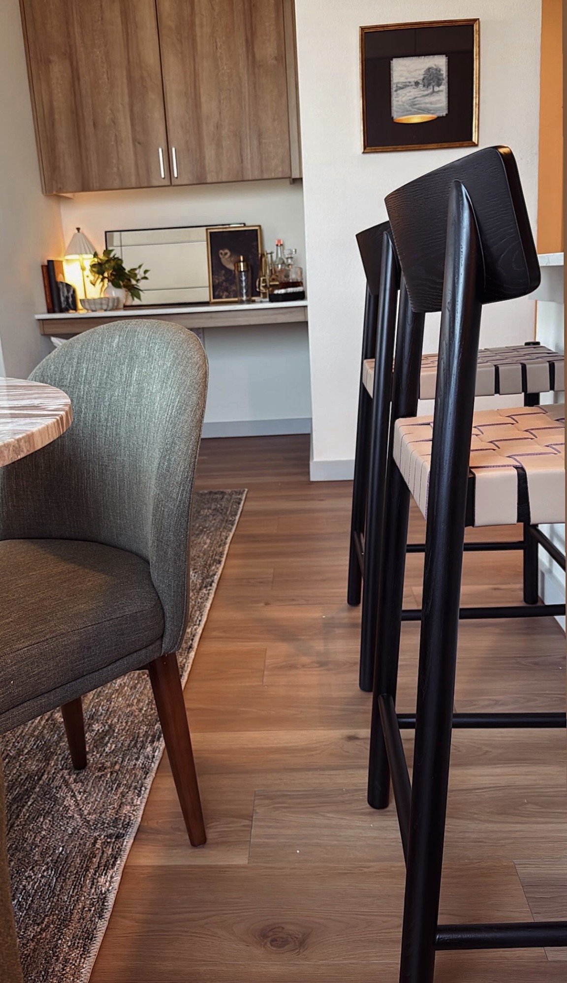 Apartments don’t have to feel like apartments. It’s all about layering warm tones, cozy textures, and a thoughtful mix of materials to make the space feel personal and elevated. ✨

For this project, I transformed a built-in desk into a mini bar — perfect for a client who loves to entertain and had no need for a home office. 🍸 We also added a round table to create extra dining space without overwhelming the layout.

A plush rug grounds the living area and adds that inviting, lived-in vibe. And of course, no space is complete without the right accessories. It’s all in the details. 🖼️🌿

#MorganPageDesigns #ApartmentStyle #ApartmentDesign #interiorInspo #InteriorDesign #LoftLiving #WacoTexas #WacoDesign 

#LTKHome