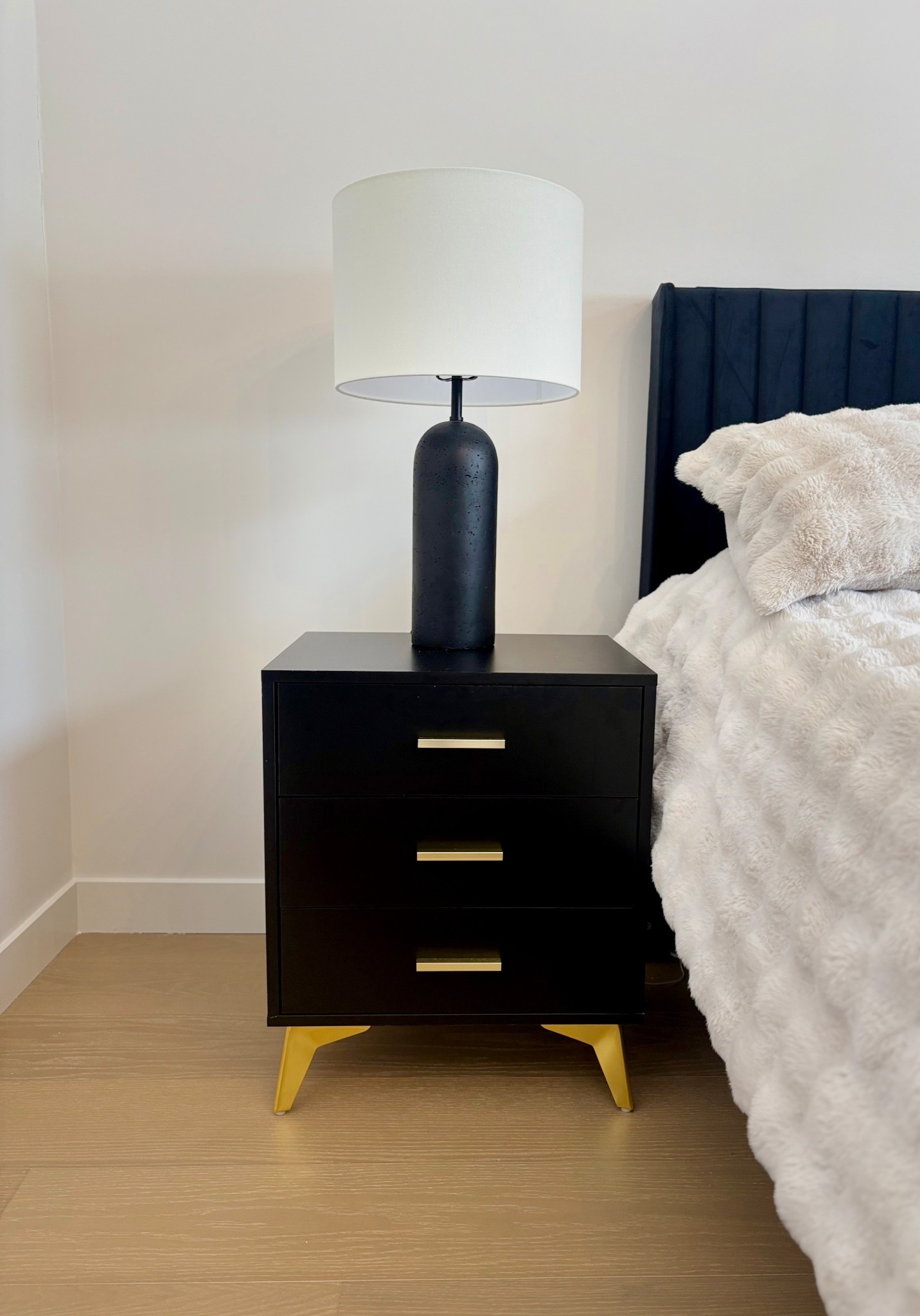 This sleek black nightstand with gold legs has been such a game-changer for our bedroom!
The exact black is sold out, but similar styles (including white) are linked! 

#LTKhome #LTKcanada #LTKfamily