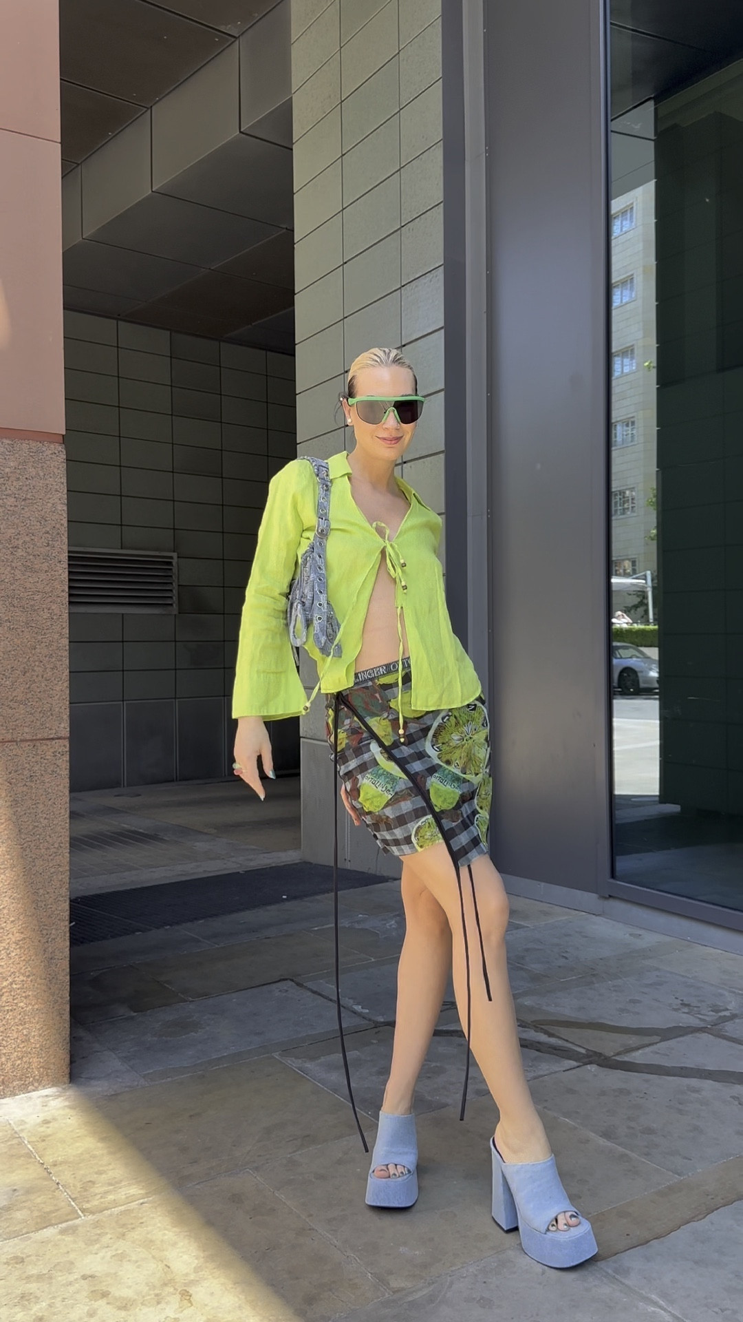 The ultimate summer fit! Love the fresh colour of this linen shirt (mine is from Zara but added a few nice cardigan options for you). The colour is the perfect match to the cute lime printed, wrap-effect mesh skirt. I cannot live without denim so wearing my denim bag and platform mules with this outfit. 

#LTKeurope #LTKSeasonal #LTKfit