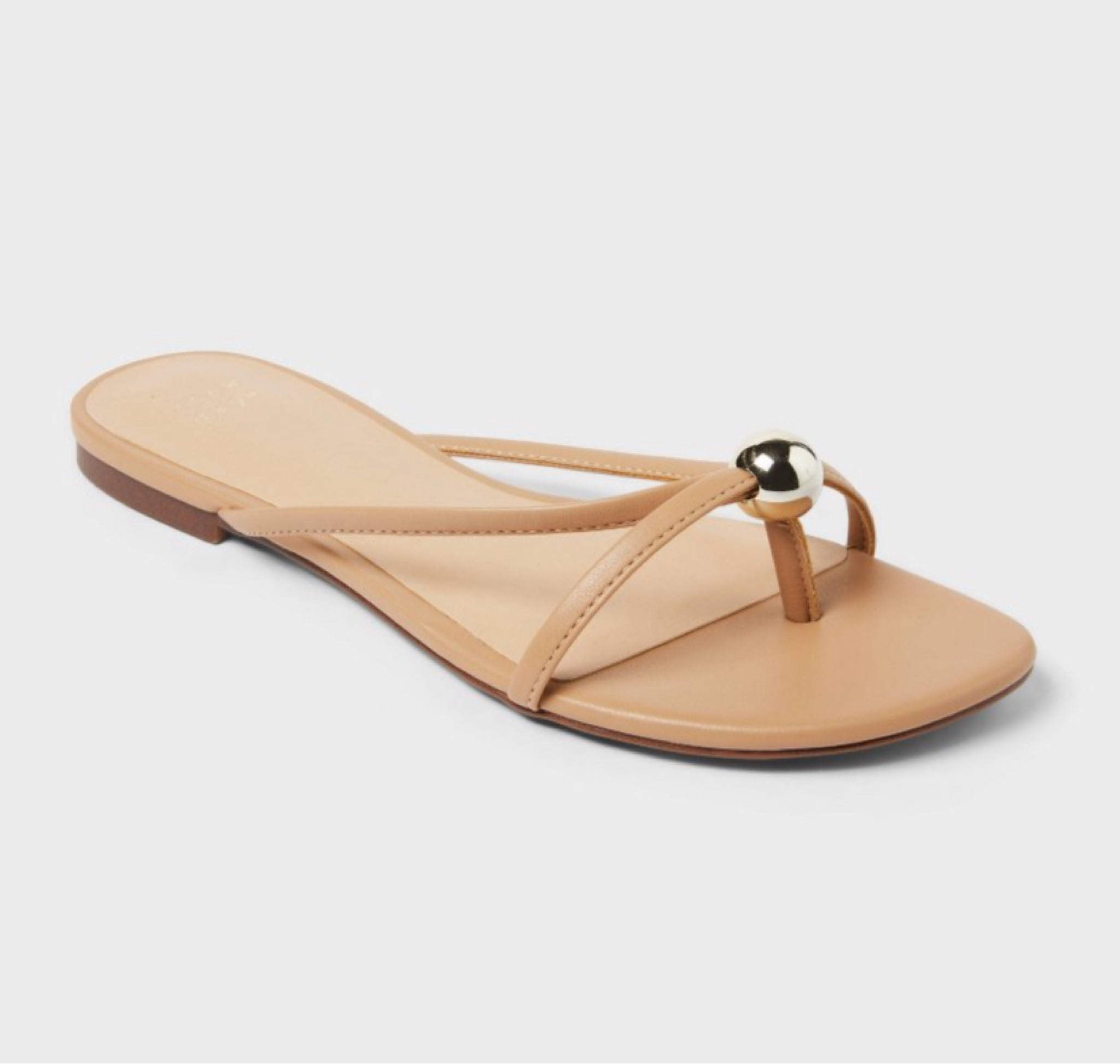 Tan flip flop with gold detail 

#LTKShoeCrush #LTKStyleTip #LTKSeasonal